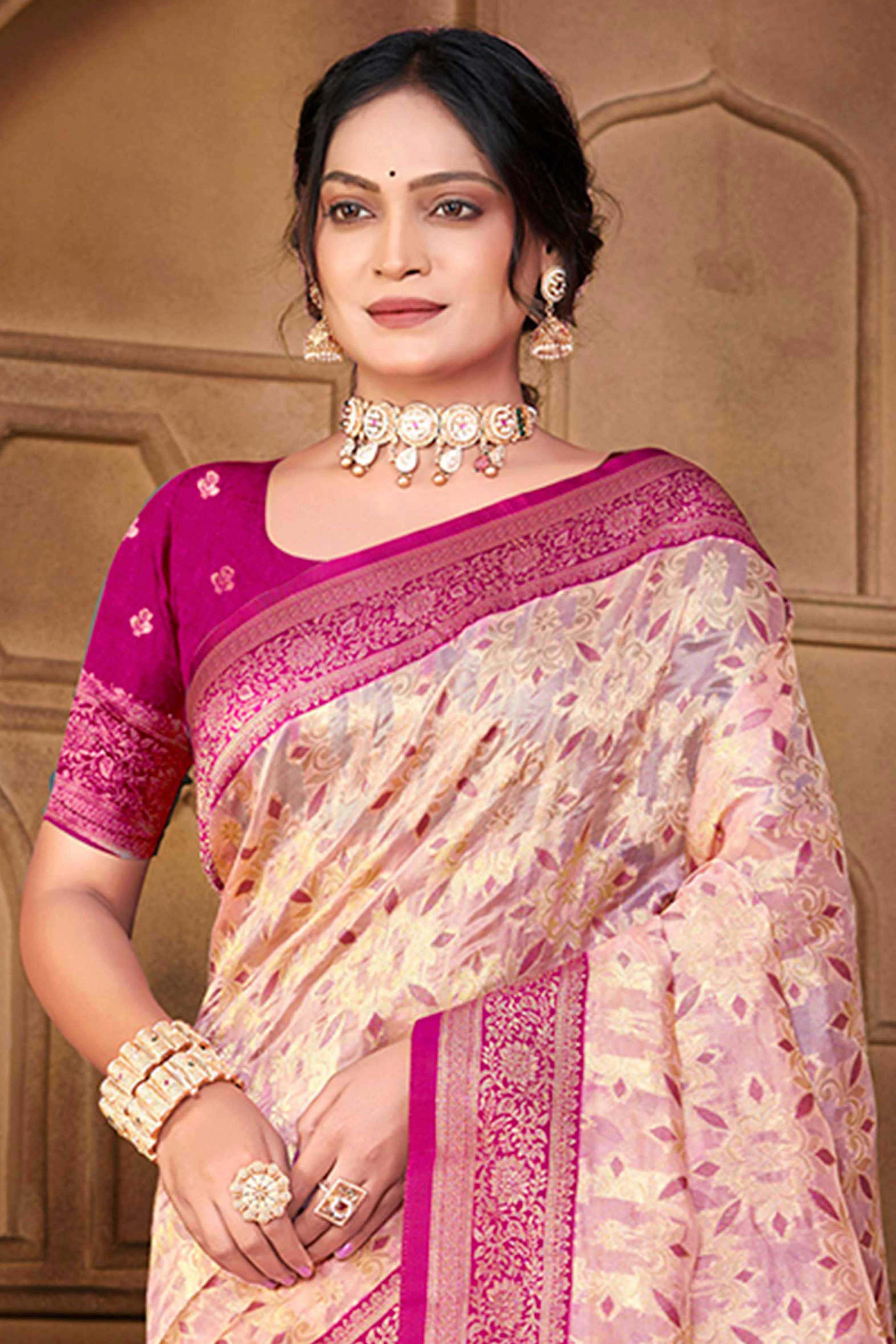 Stunning Pastel Magenta Floral Weaving Silk Blend Saree Enhanced With A Stylish Tassel Pallu