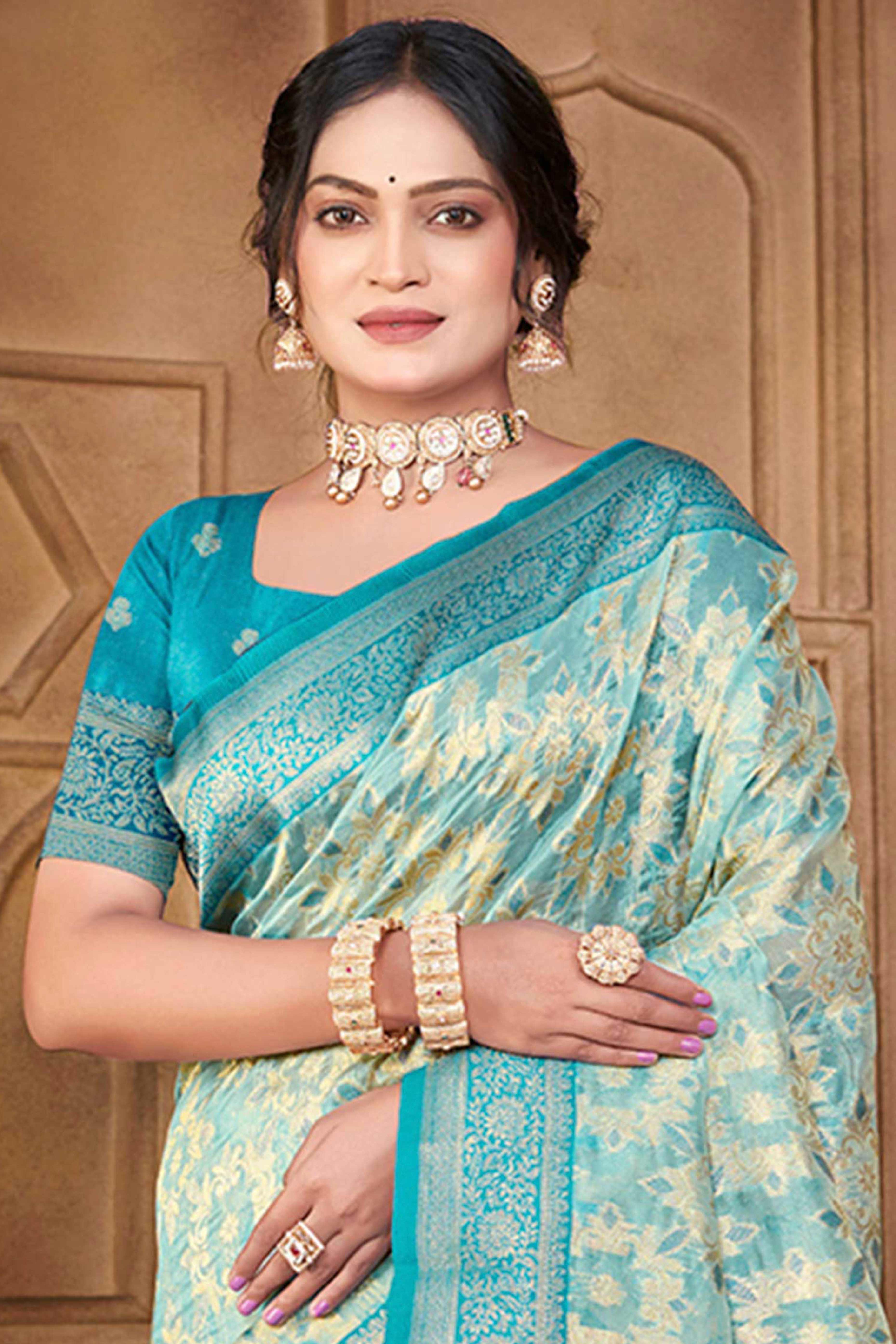 Stunning Blue Floral Weaving Silk Blend Saree Enhanced With A Stylish Tassel Pallu