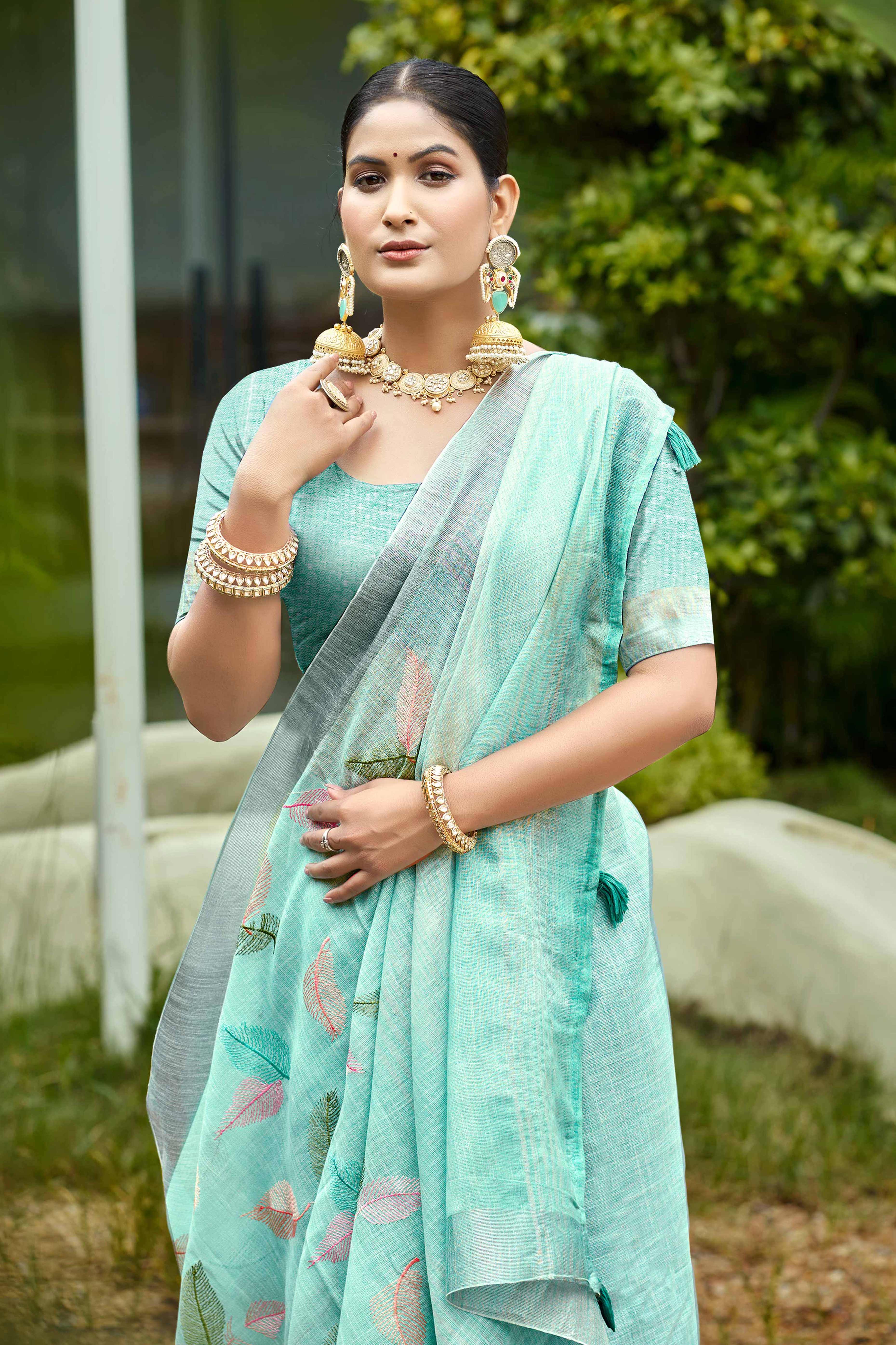 Exquisite Turquoise Leaf Motif Thread Embroidered Linen Saree With Elegant Weaving Border