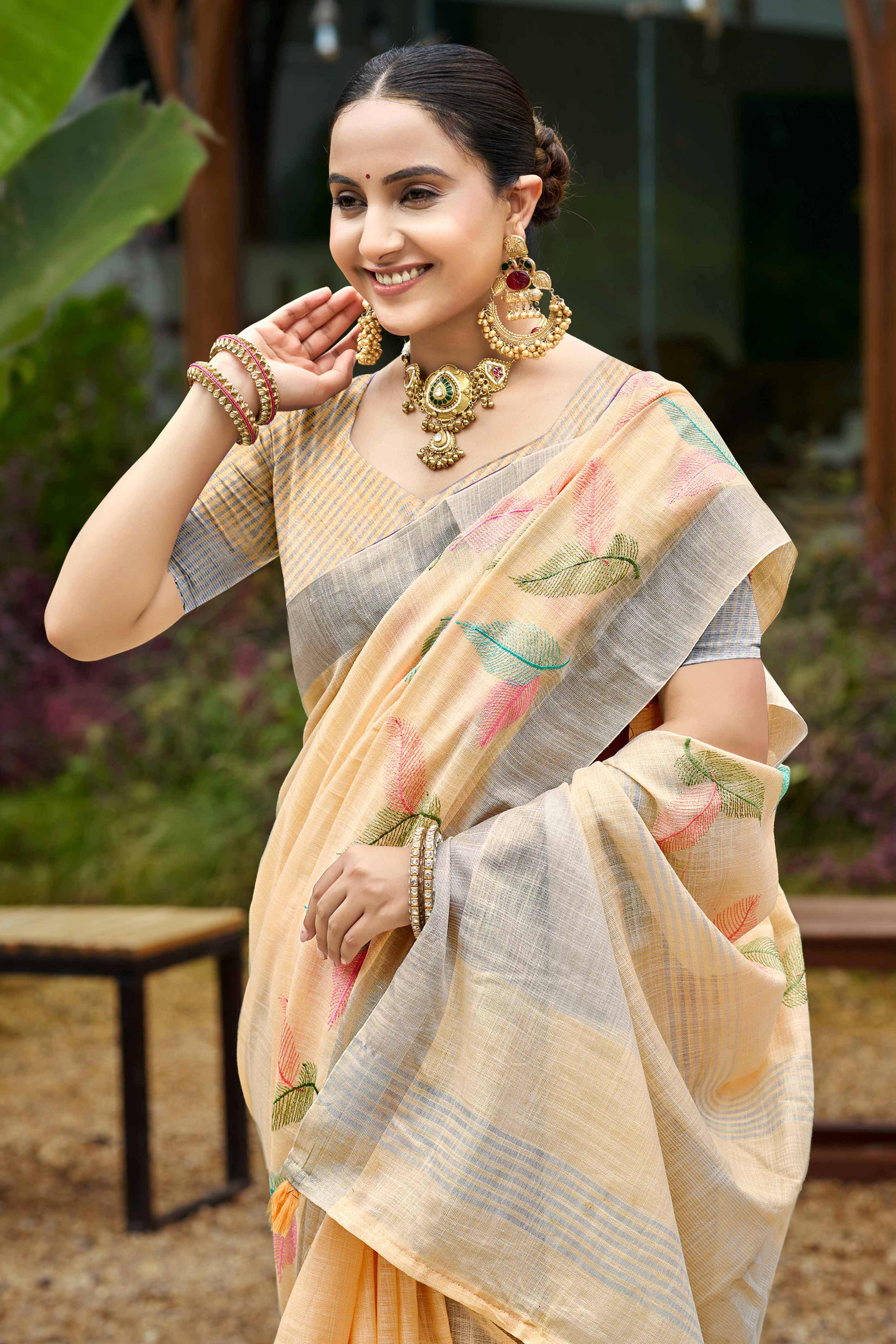 Exquisite Light Peach Leaf Motif Thread Embroidered Linen Saree With Elegant Weaving Border