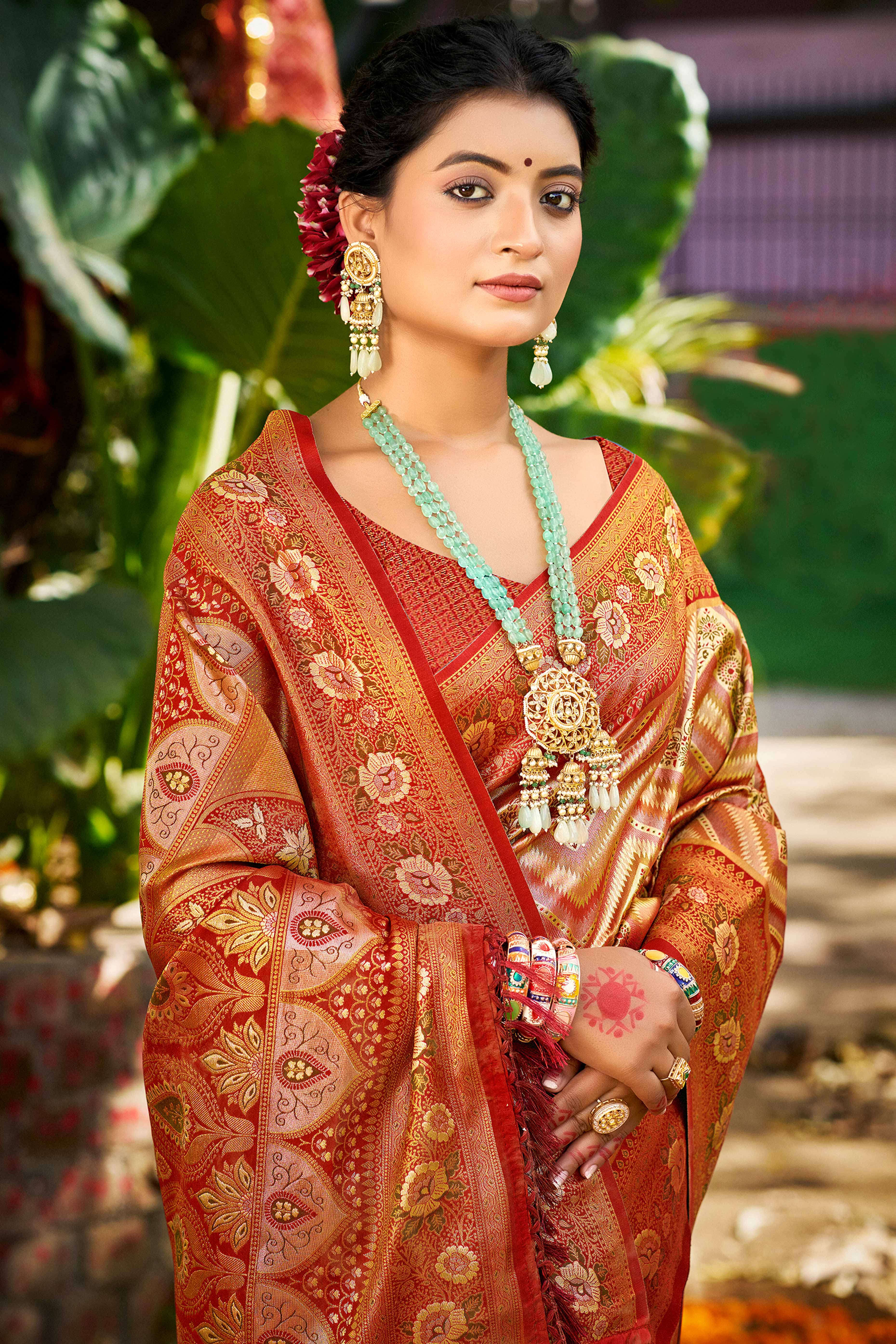 Maroon Silk Blend Dharmavaram Saree Featuring Floral & Zig Zag Woven Patterns With Tassel Finish