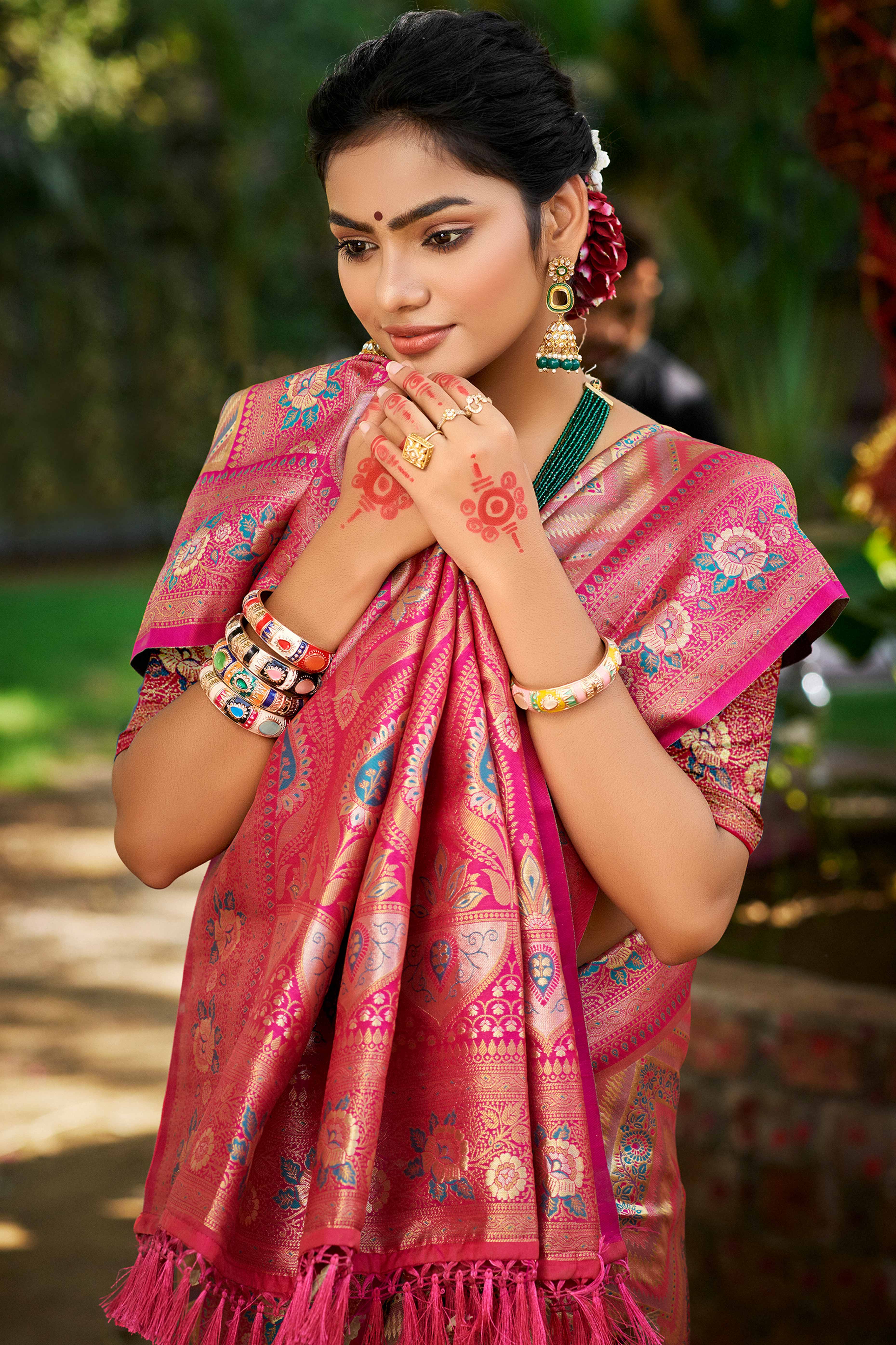 Pink Silk Blend Dharmavaram Saree Featuring Floral & Zig Zag Woven Patterns With Tassel Finish
