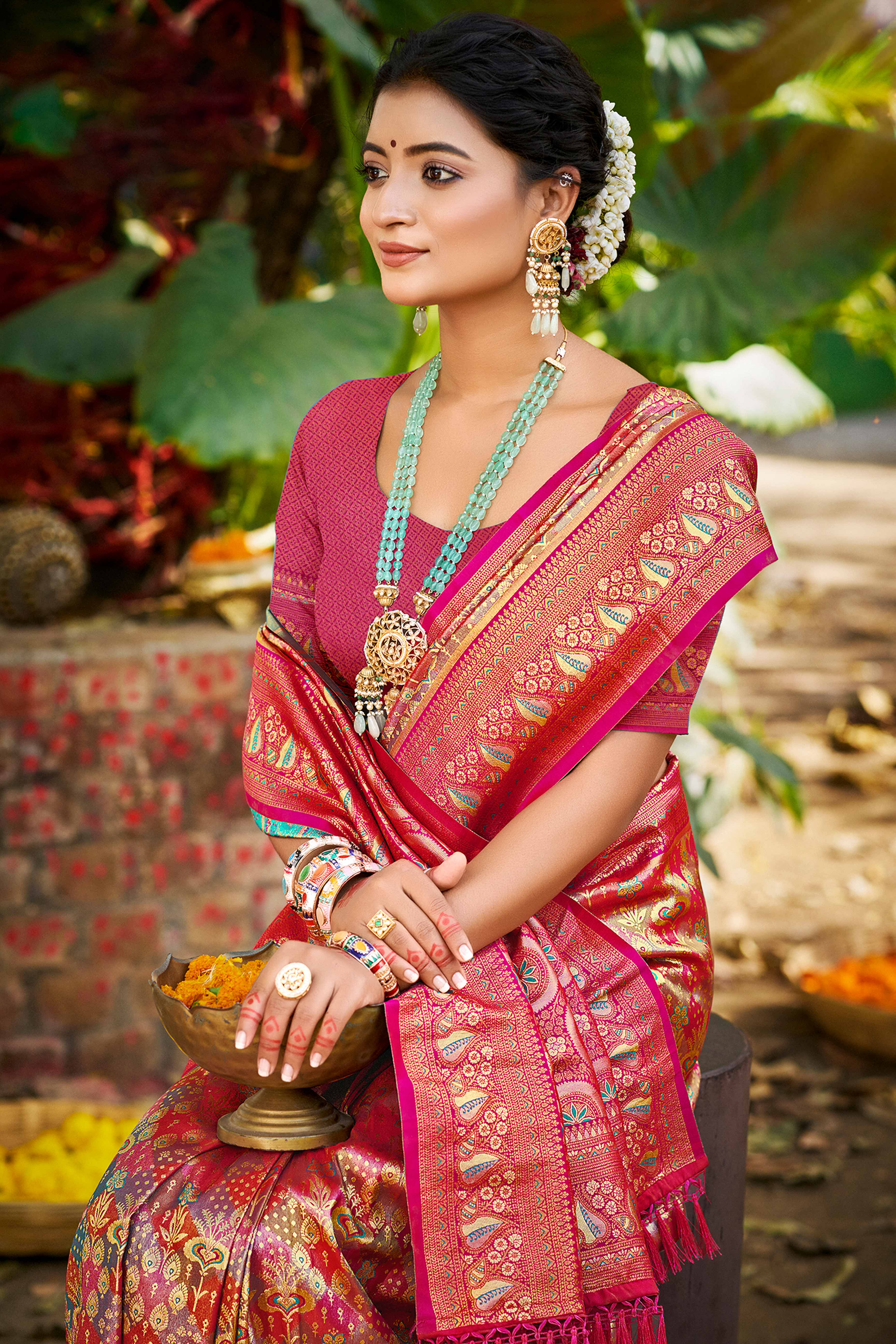 Magenta Floral Weaving Silk Blend Dharmavaram Saree Accented With Tassel Pallu