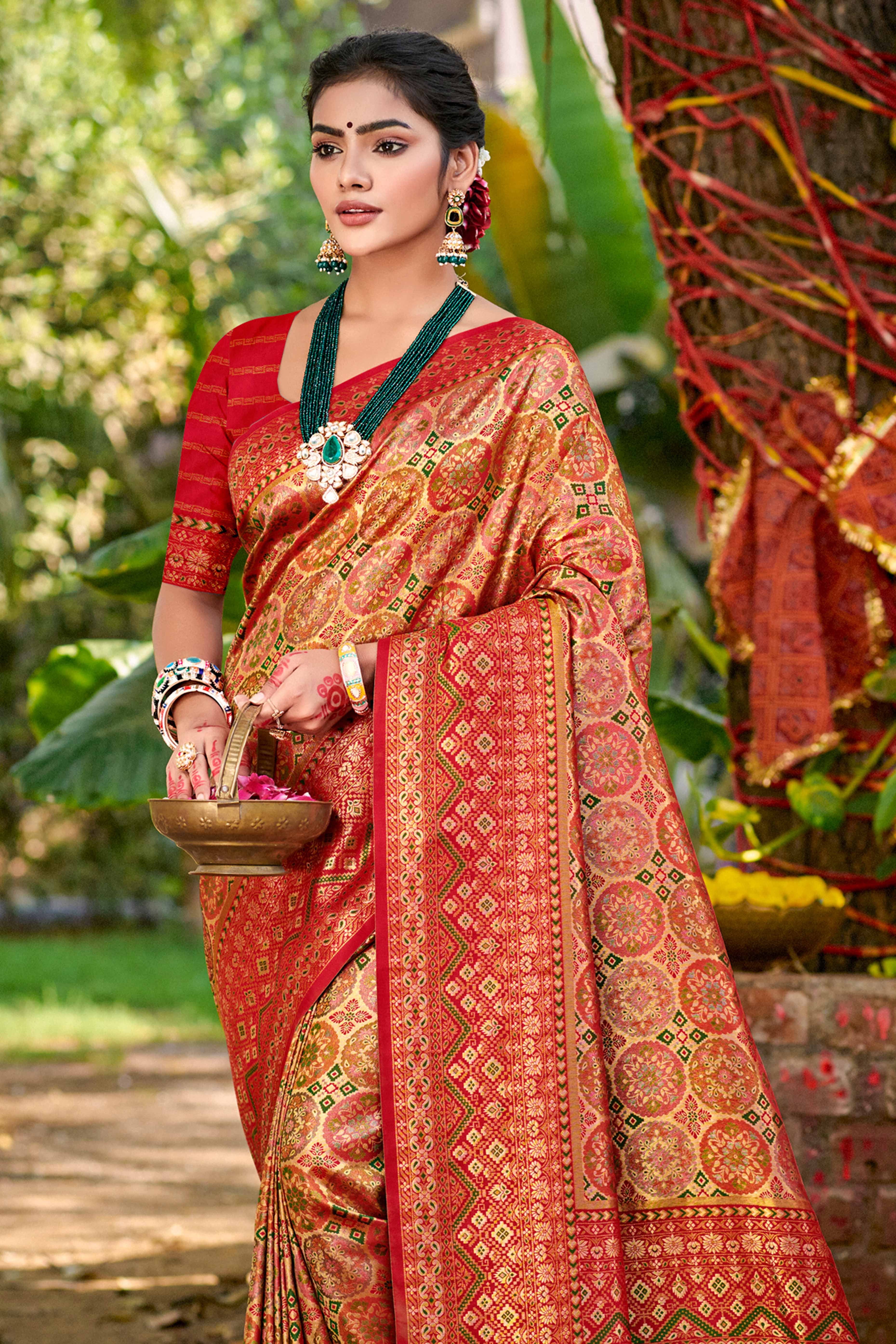 Floral Patterned Golden & Red Woven Silk Blend Dharmavaram Saree With Tassel Elegance