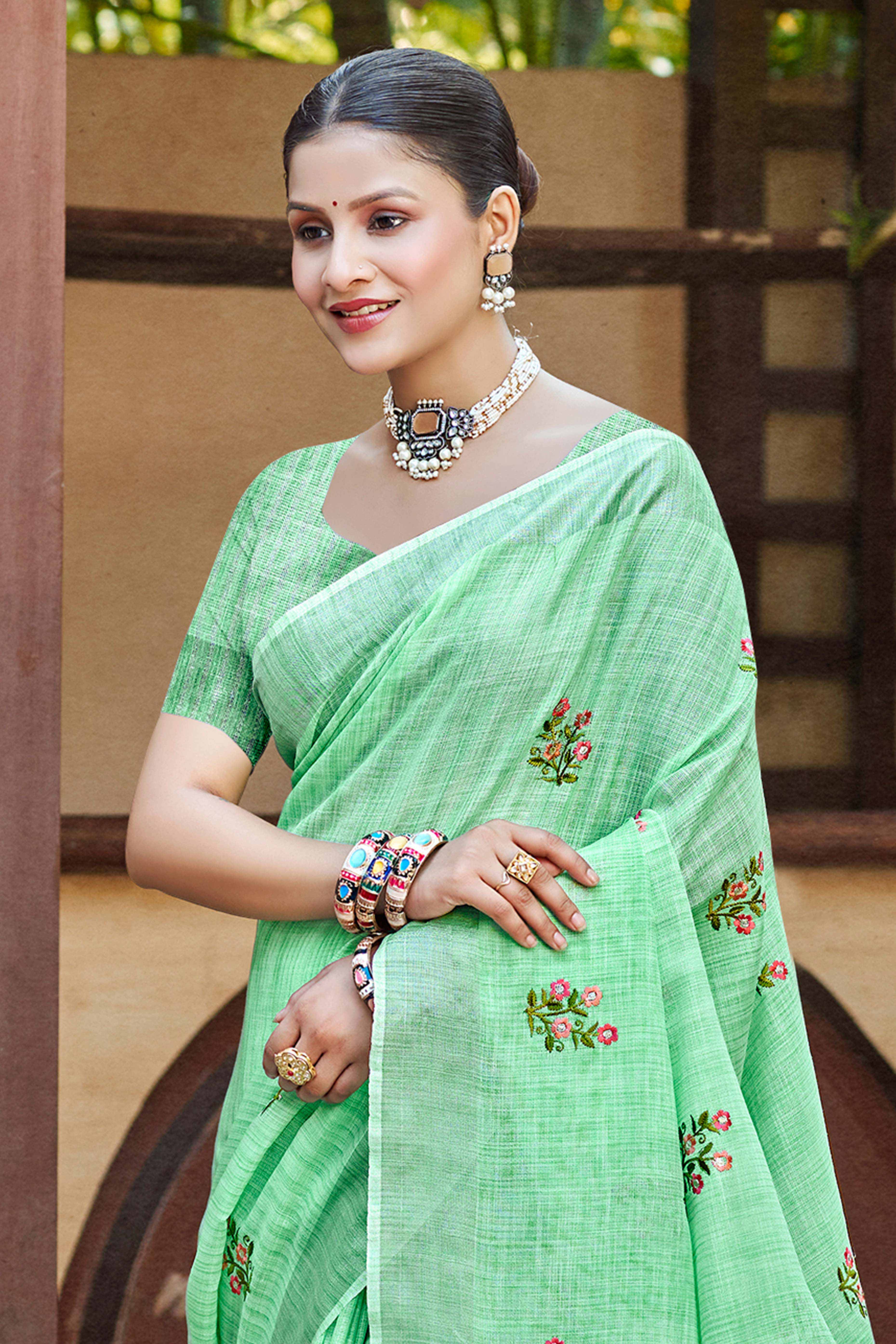 Pista Green Embroidered Linen Saree with Floral Motifs in Woven Fabric