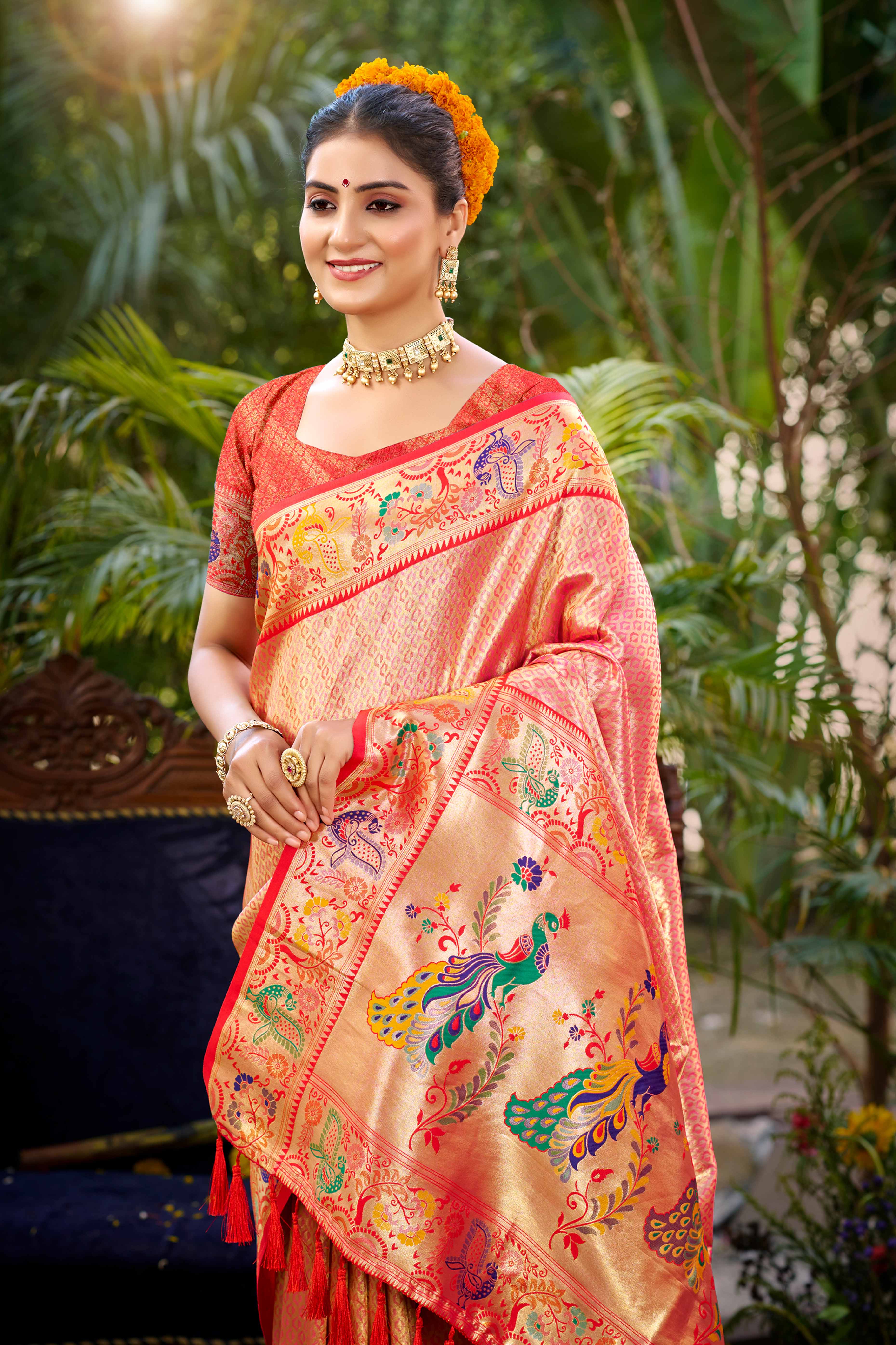 Graceful Pink Silk Blend Saree Adorned With Intricate Zari Weave & Peacock Motif Pallu