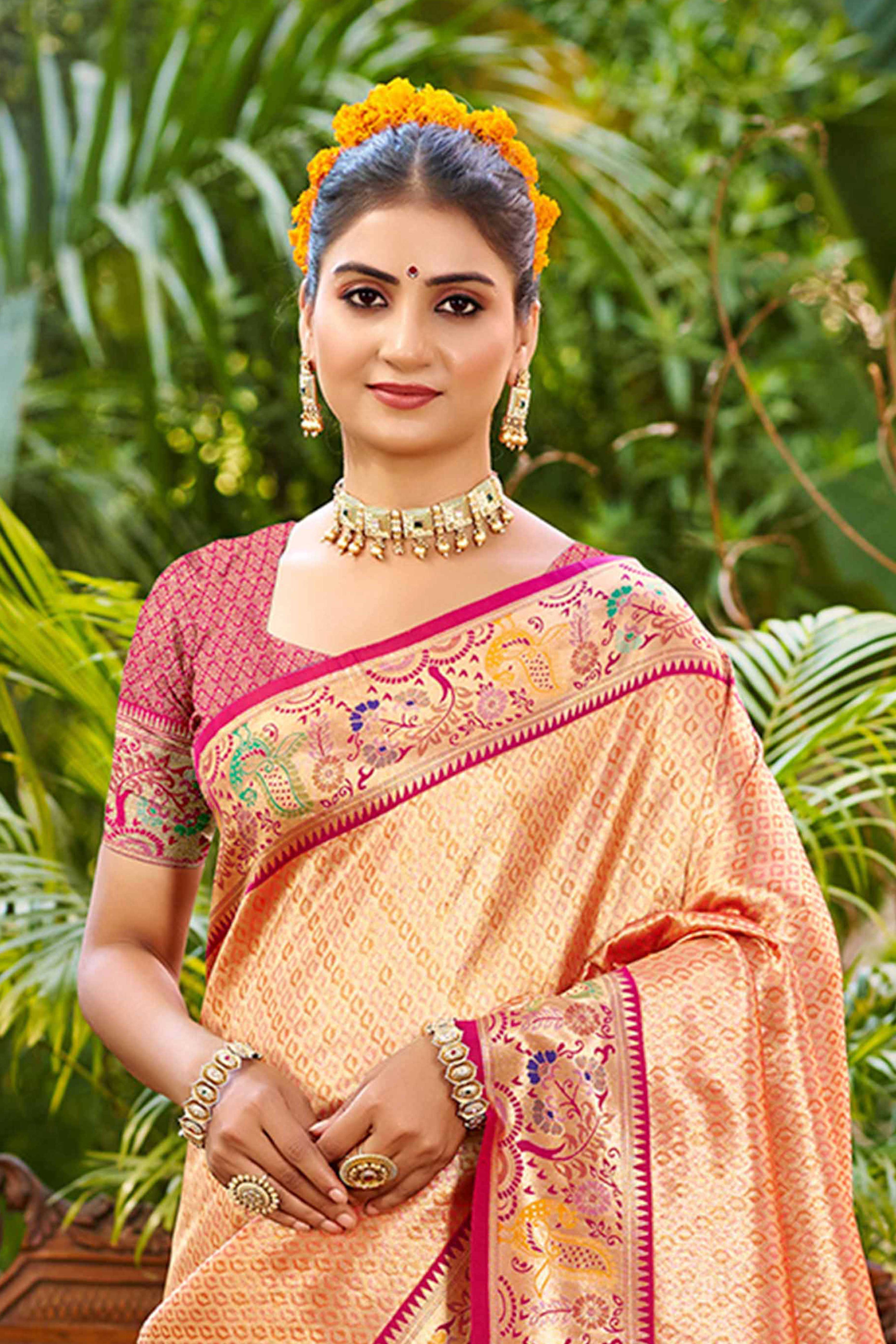 Graceful Orange Silk Blend Saree Adorned With Intricate Zari Weave & Peacock Motif Pallu