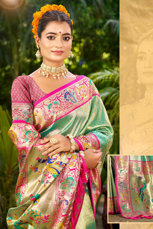Graceful Turquoise Silk Blend Saree Adorned With Intricate Zari Weave & Peacock Motif Pallu