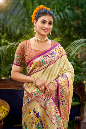 Graceful Golden Silk Blend Saree Adorned With Intricate Zari Weave & Peacock Motif Pallu