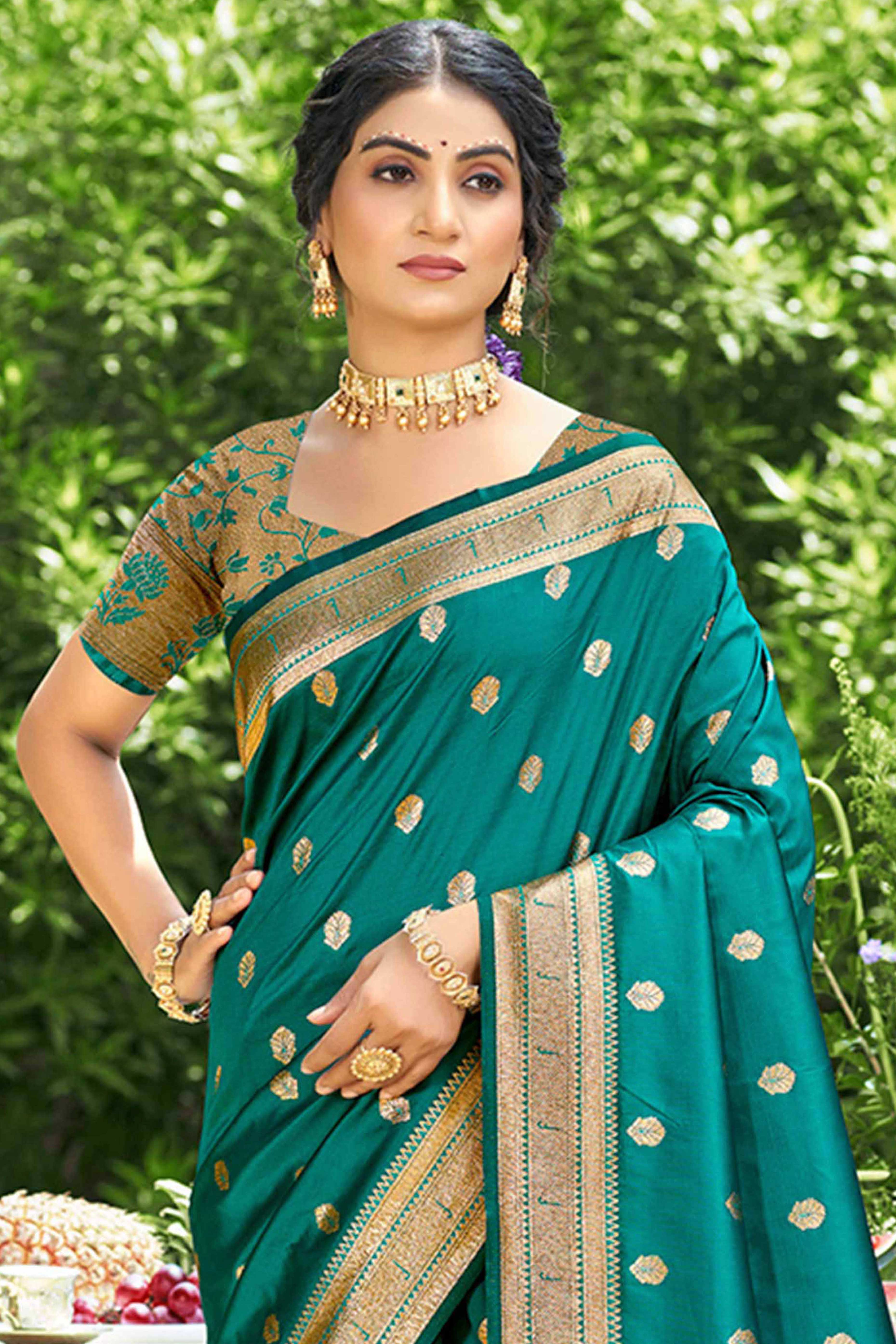 Teal Zari Weaving Silk Blend Saree Adorned With Intricate Peacock Motif Pallu & Graceful Tassel