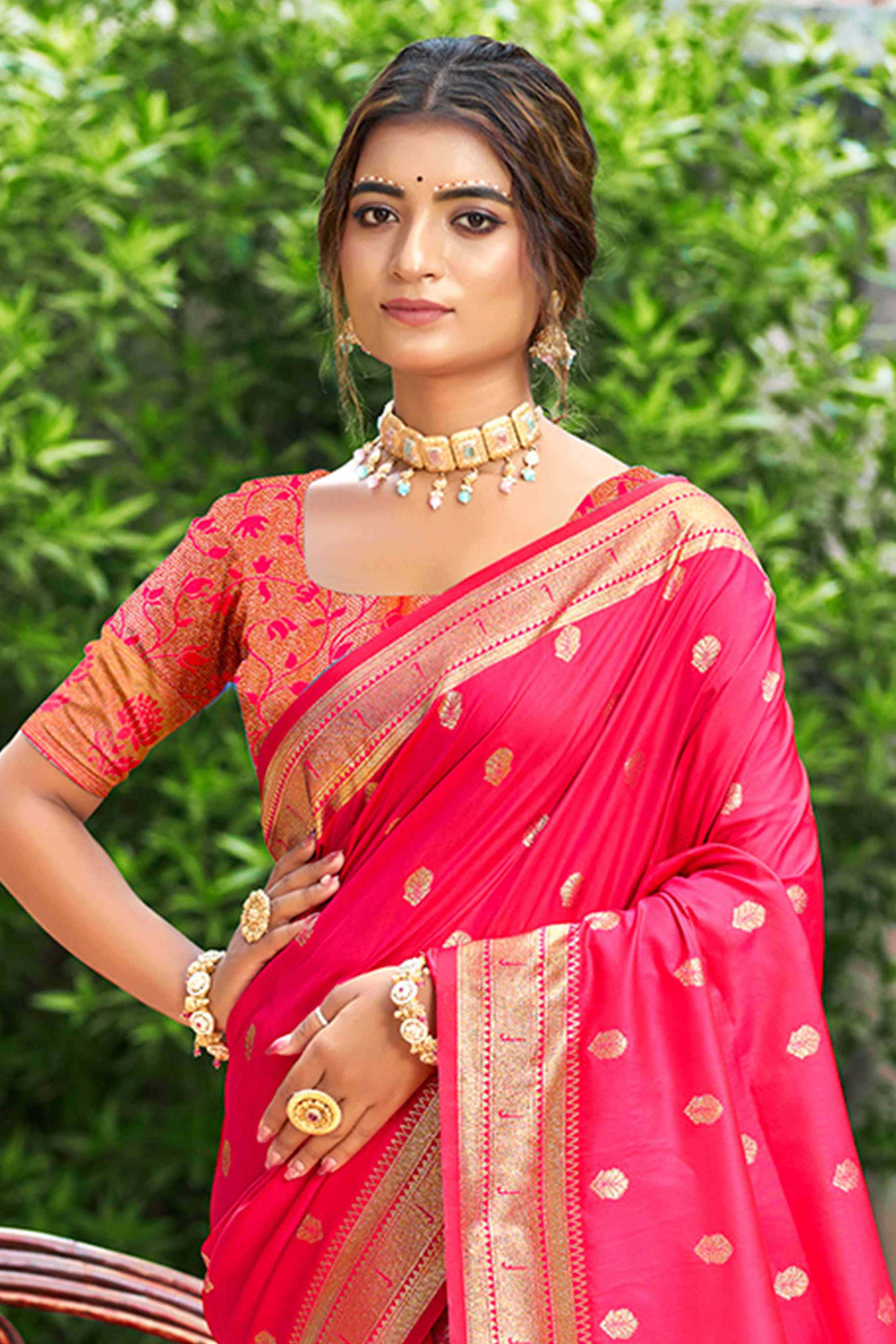 Rani Pink Zari Weaving Silk Blend Saree Adorned With Intricate Peacock Motif Pallu & Graceful Tassel