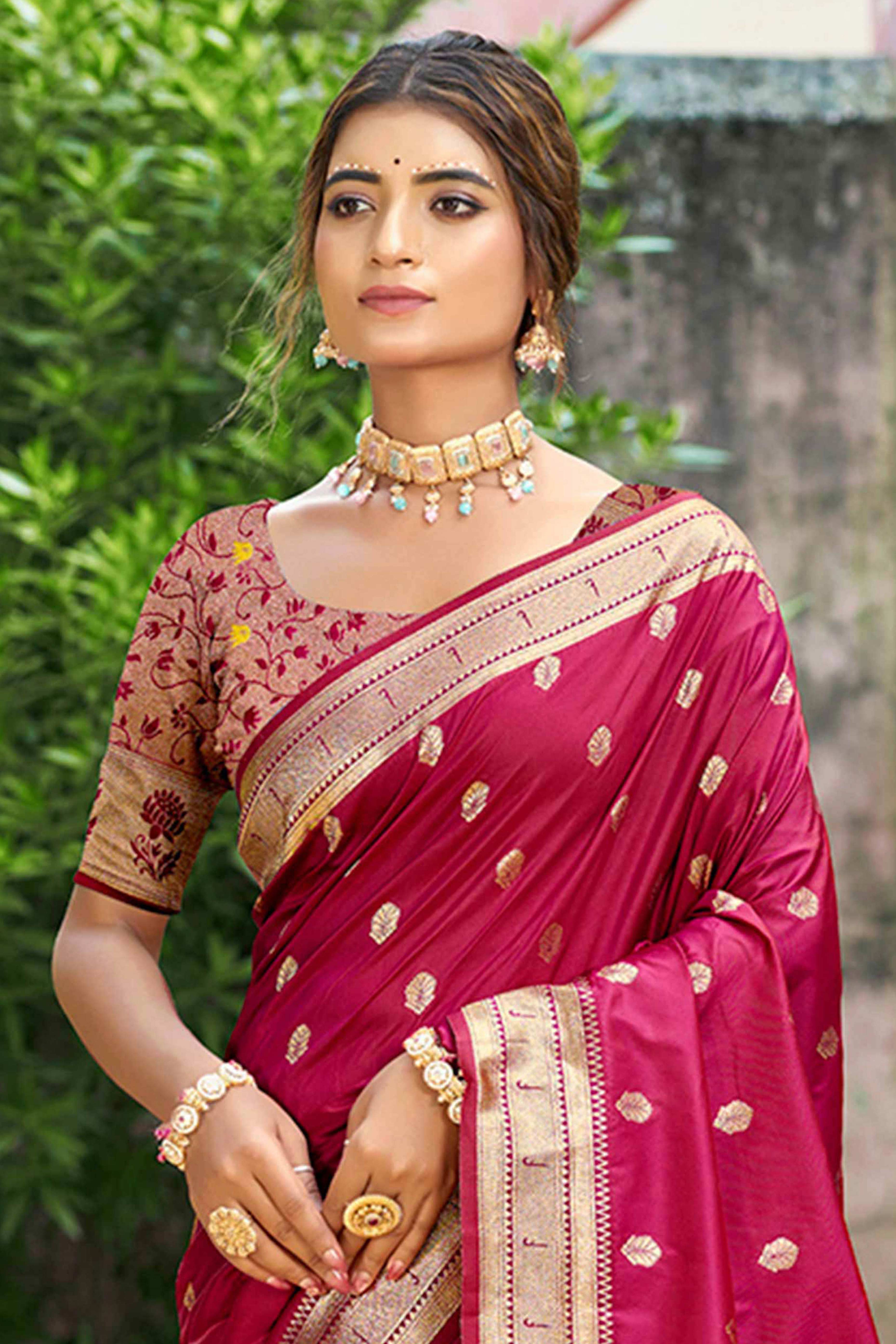 Deep Magenta Zari Weaving Silk Blend Saree Adorned With Peacock Motif Pallu & Graceful Tassel