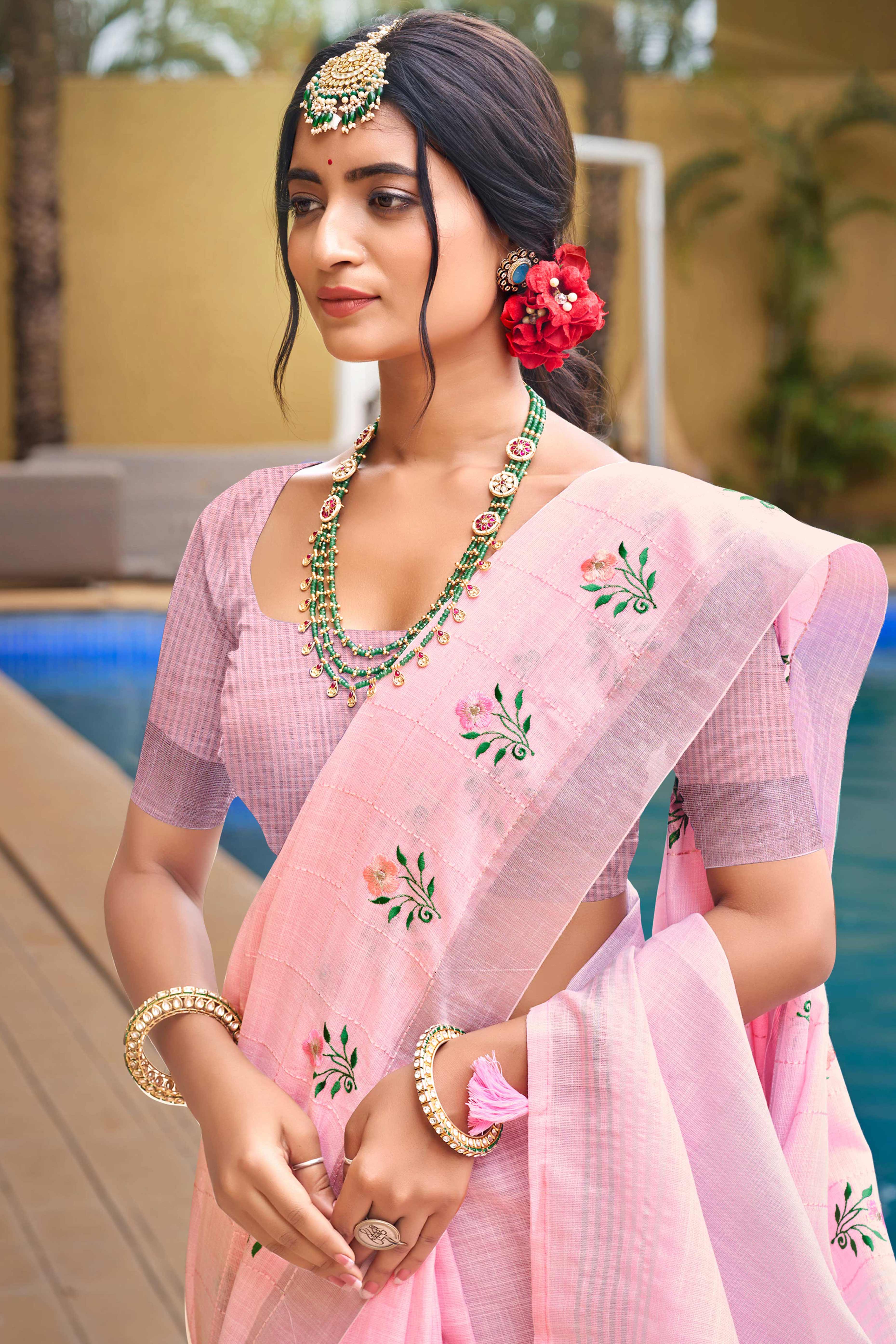 Captivating Pastel Pink Floral Thread Embroidered Linen Saree With Elegant Weaving Border