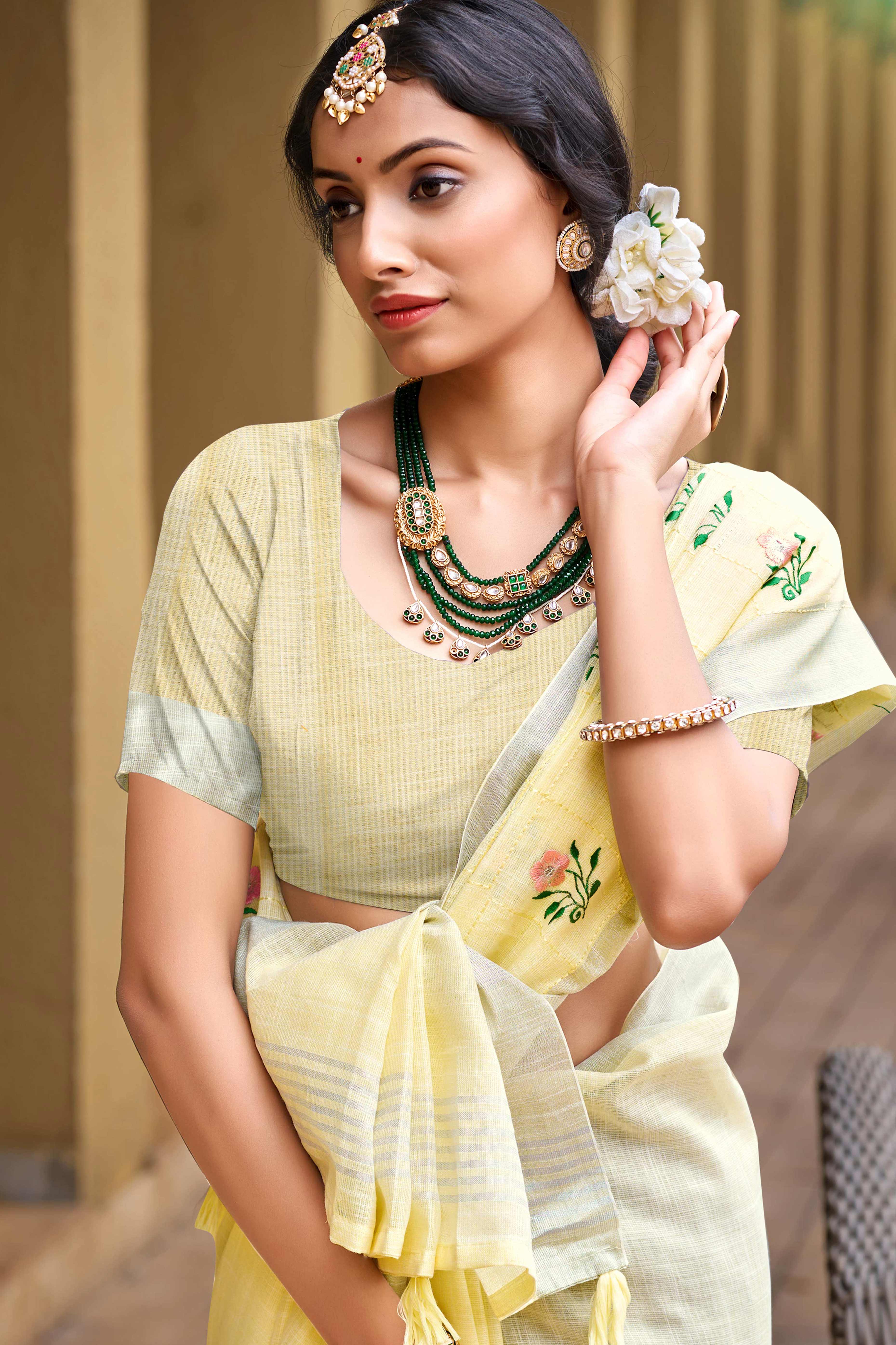 Captivating Yellow Floral Thread Embroidered Linen Saree With Elegant Weaving Border