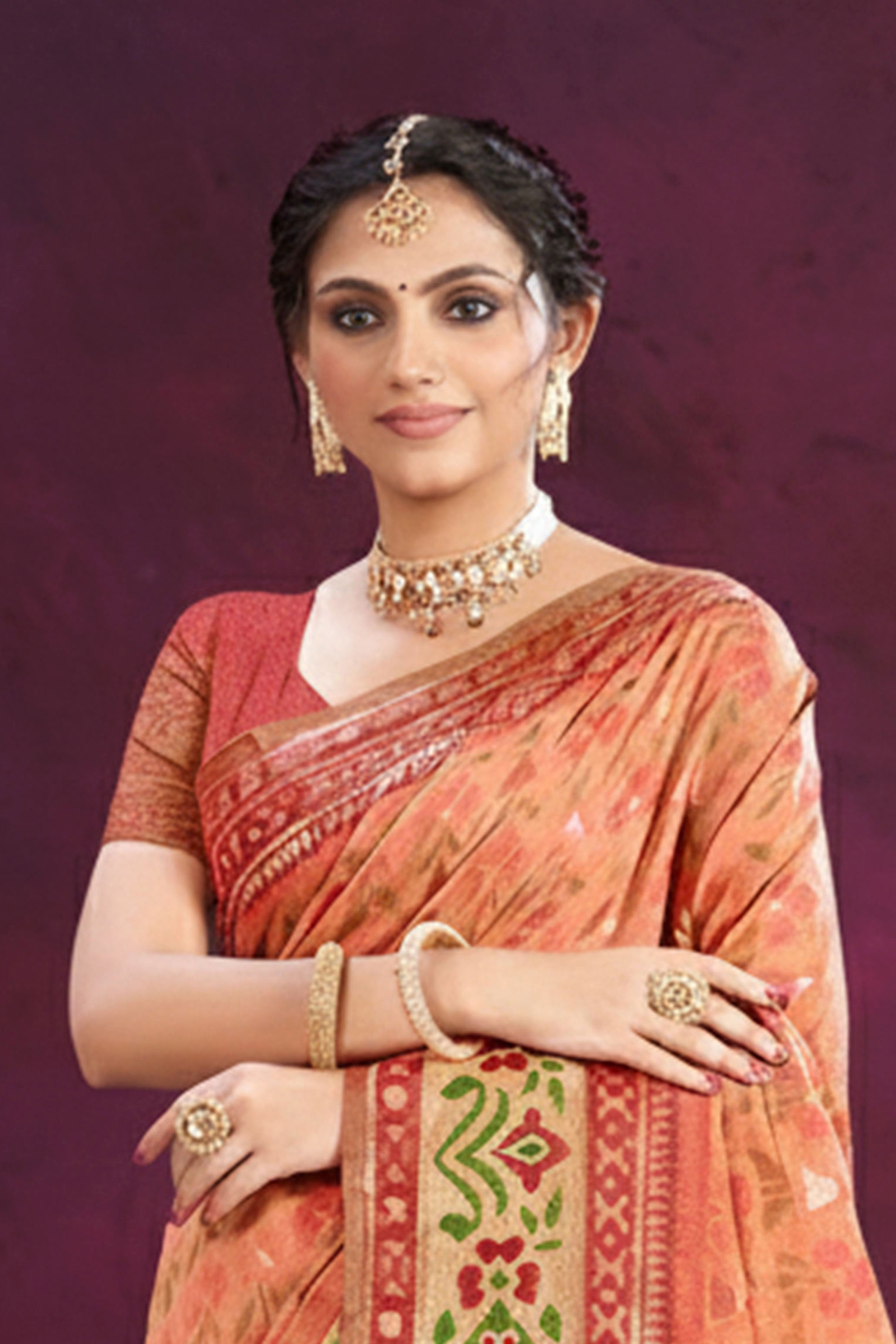 Designer Light Orange Cotton Silk Saree Showcasing Delicate Floral Weaving & Tassel Pallu