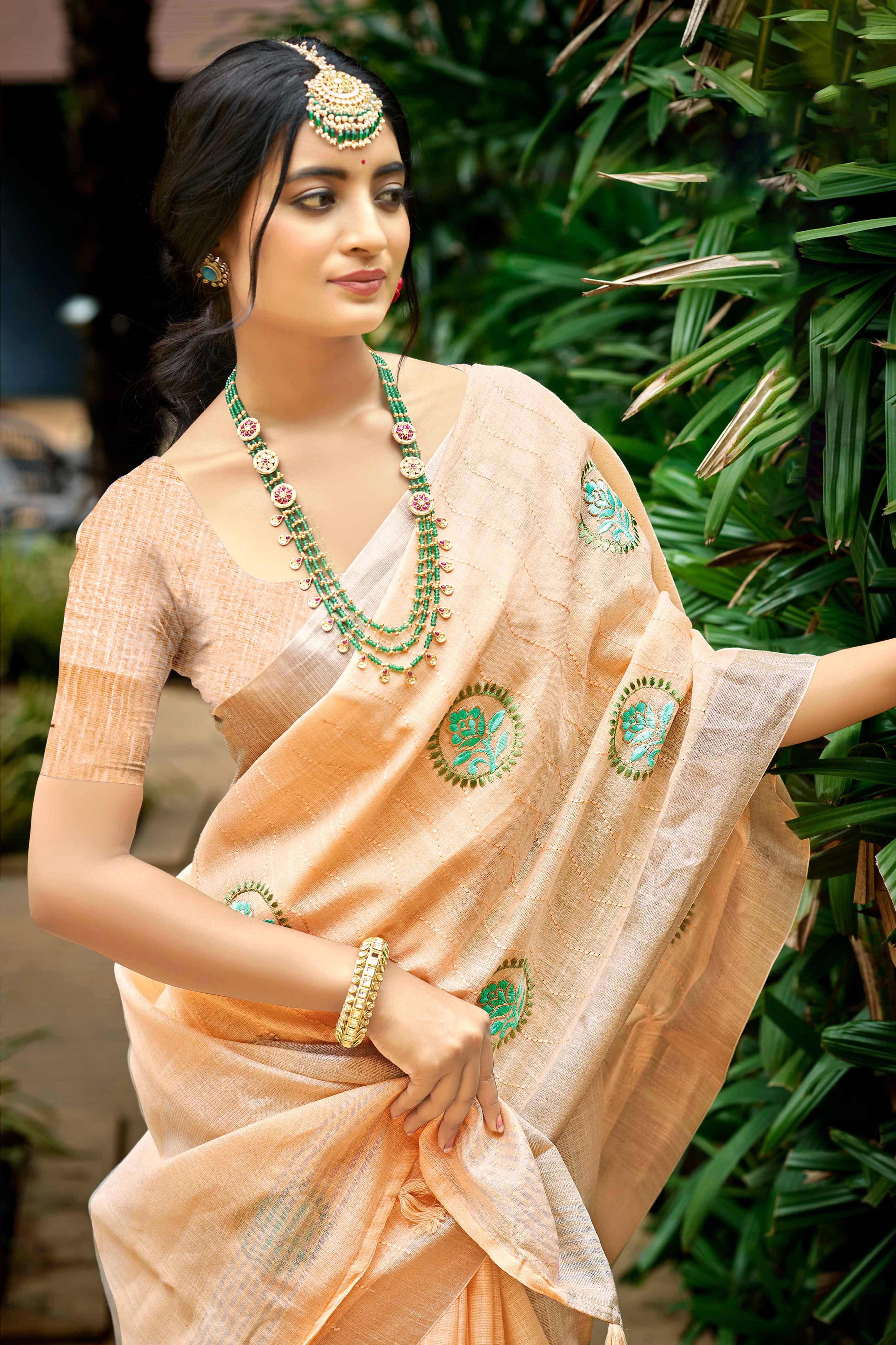 Premium Light Peach Floral Embroidered Linen Saree With Striped Pattern Tassel Pallu