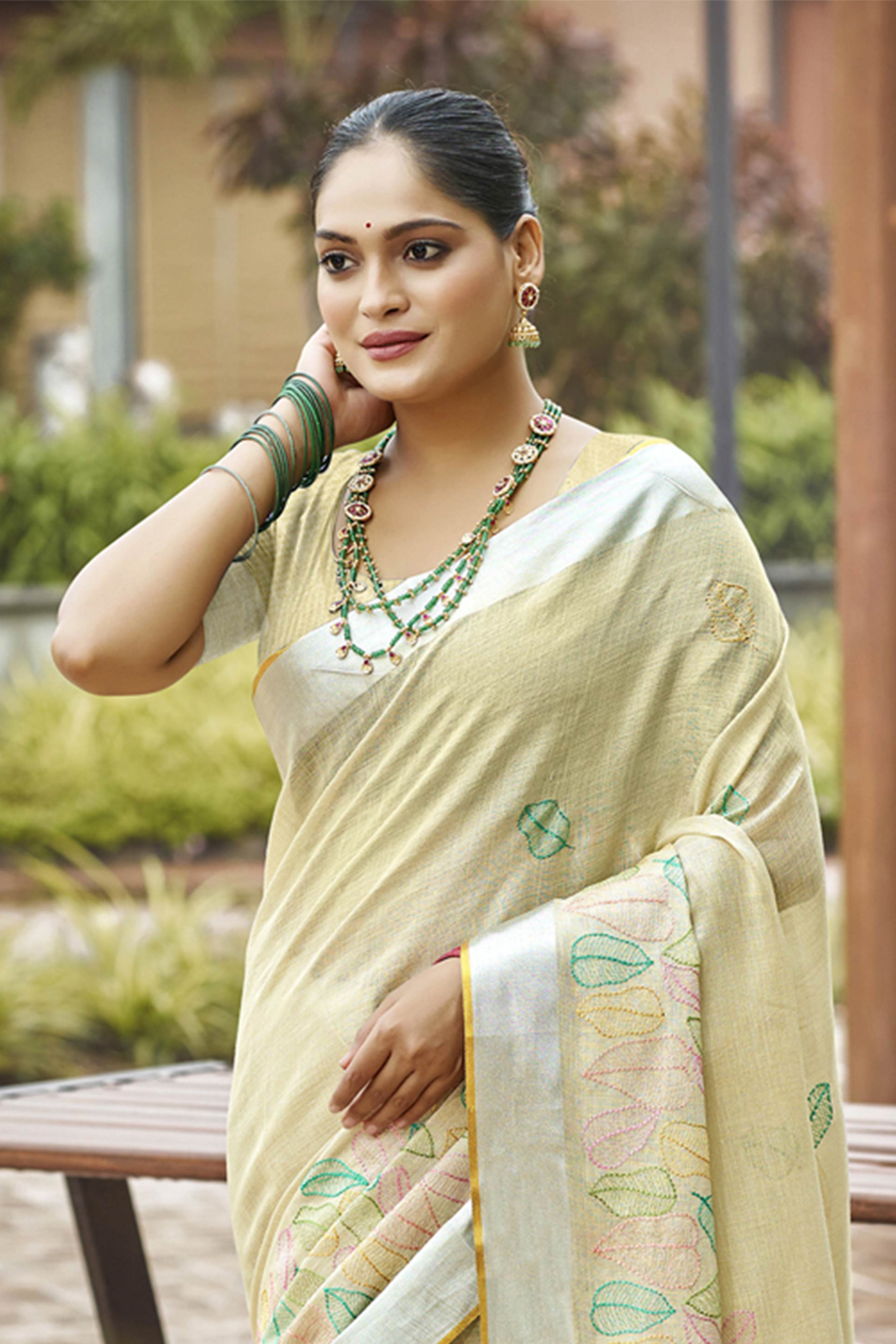Classic Pista Green Leaf Pattern Thread Embroidery Work Linen Saree With Tassel Pallu