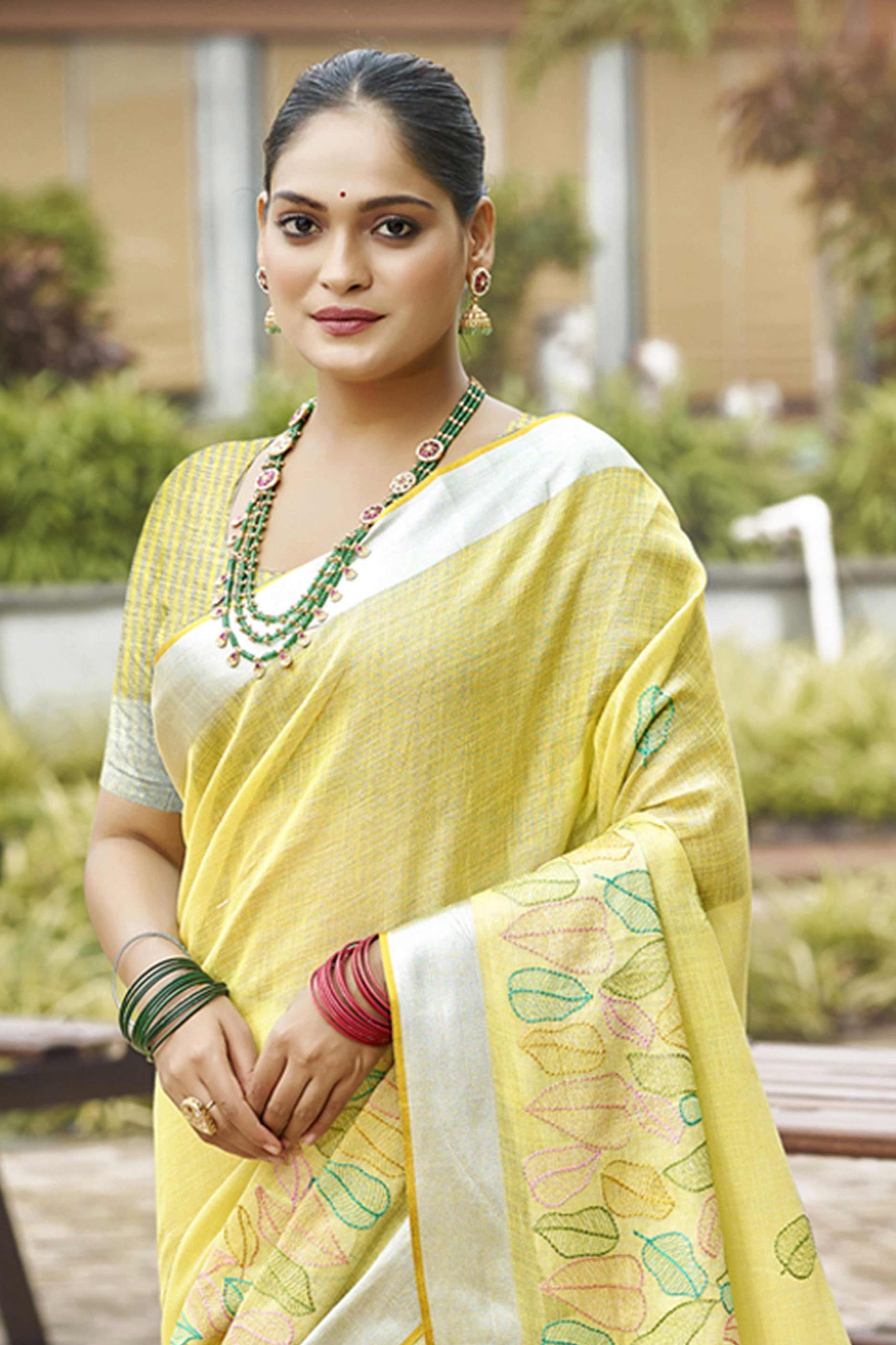 Classic Yellow Leaf Pattern Thread Embroidery Work Linen Saree With Tassel Pallu