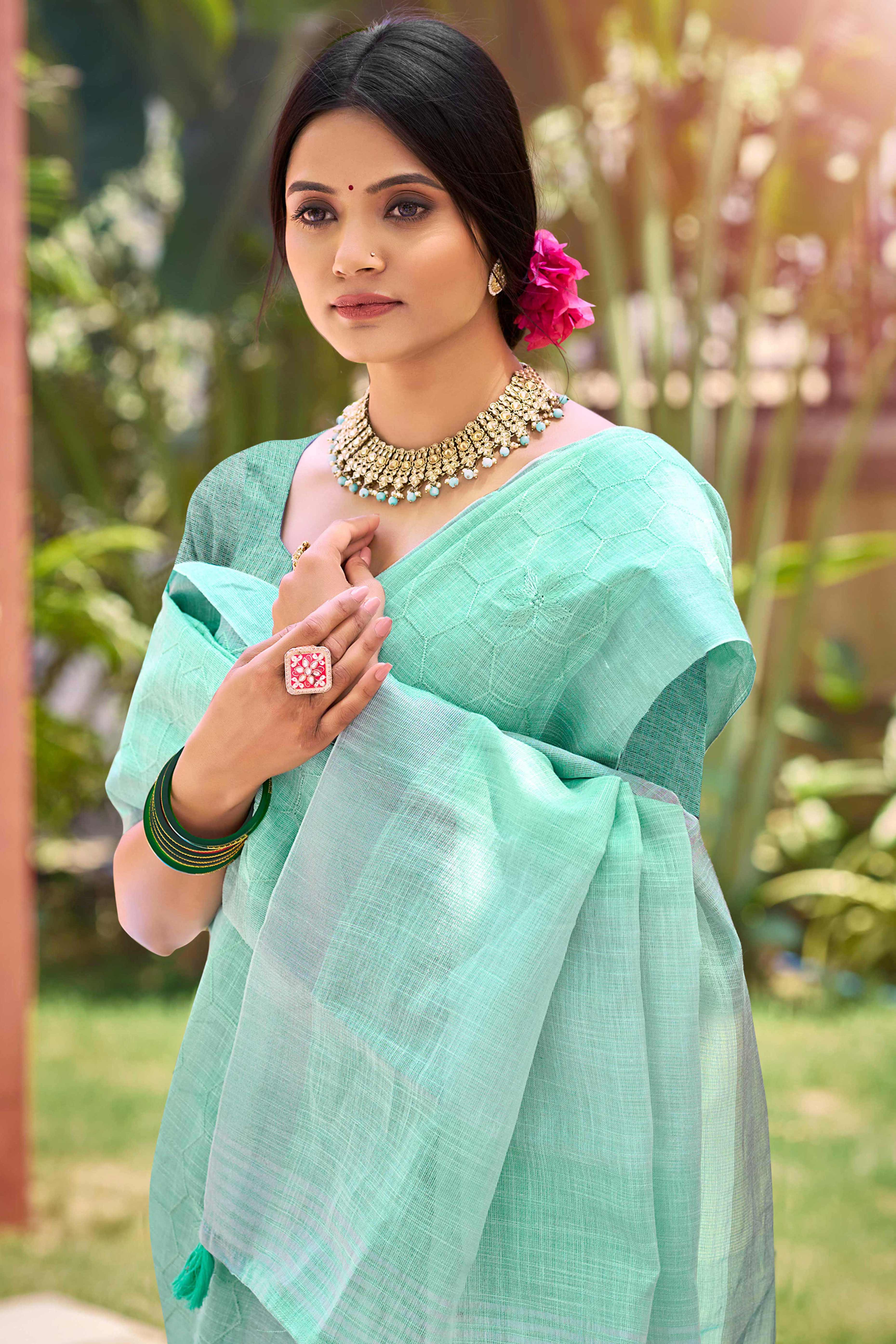 Turquoise Classic Linen Saree Enhanced With Fine Geometric Embroidery Work & Tassel Pallu