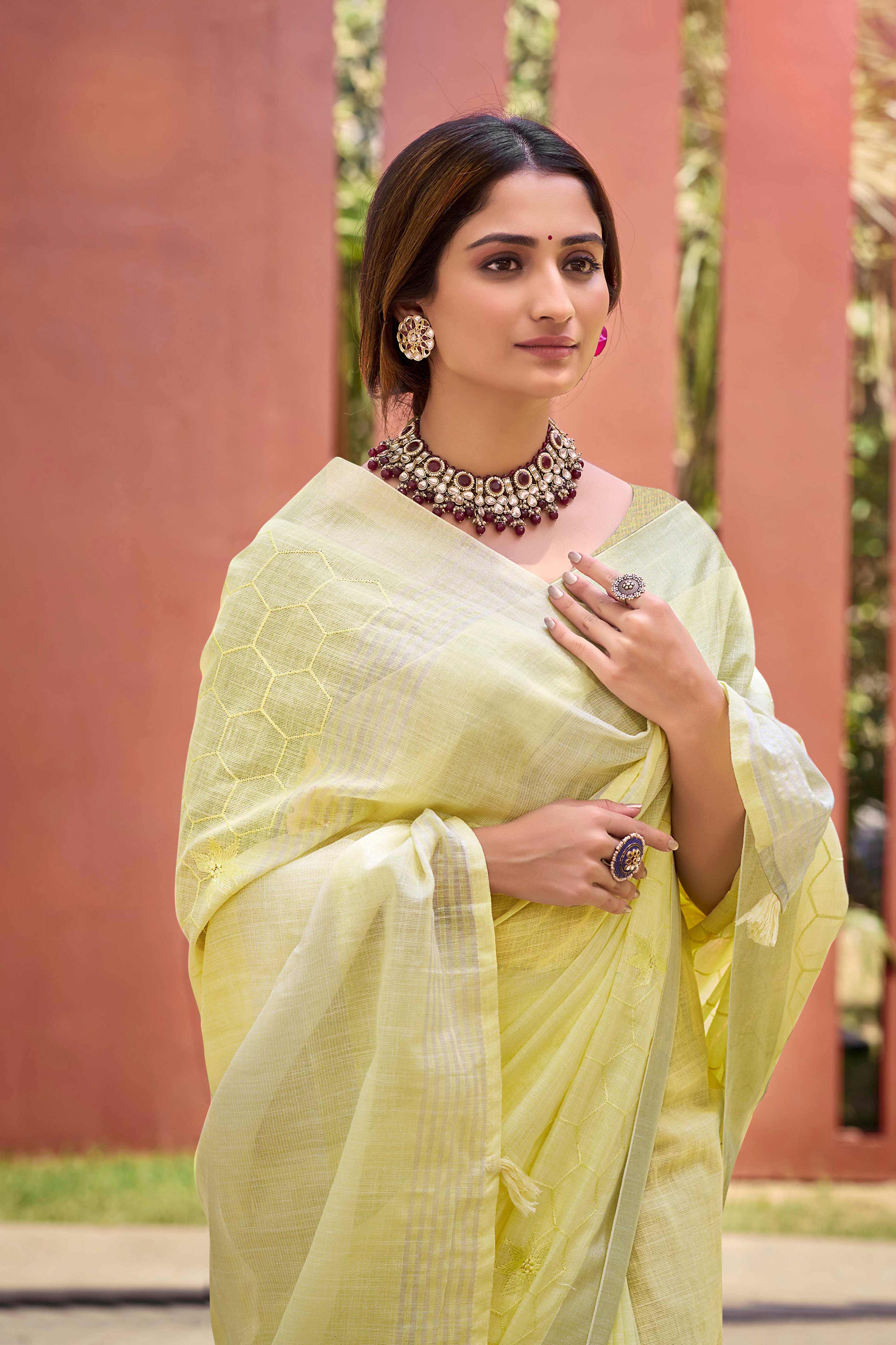 Yellow Classic Linen Saree Enhanced With Fine Geometric Embroidery Work & Tassel Pallu