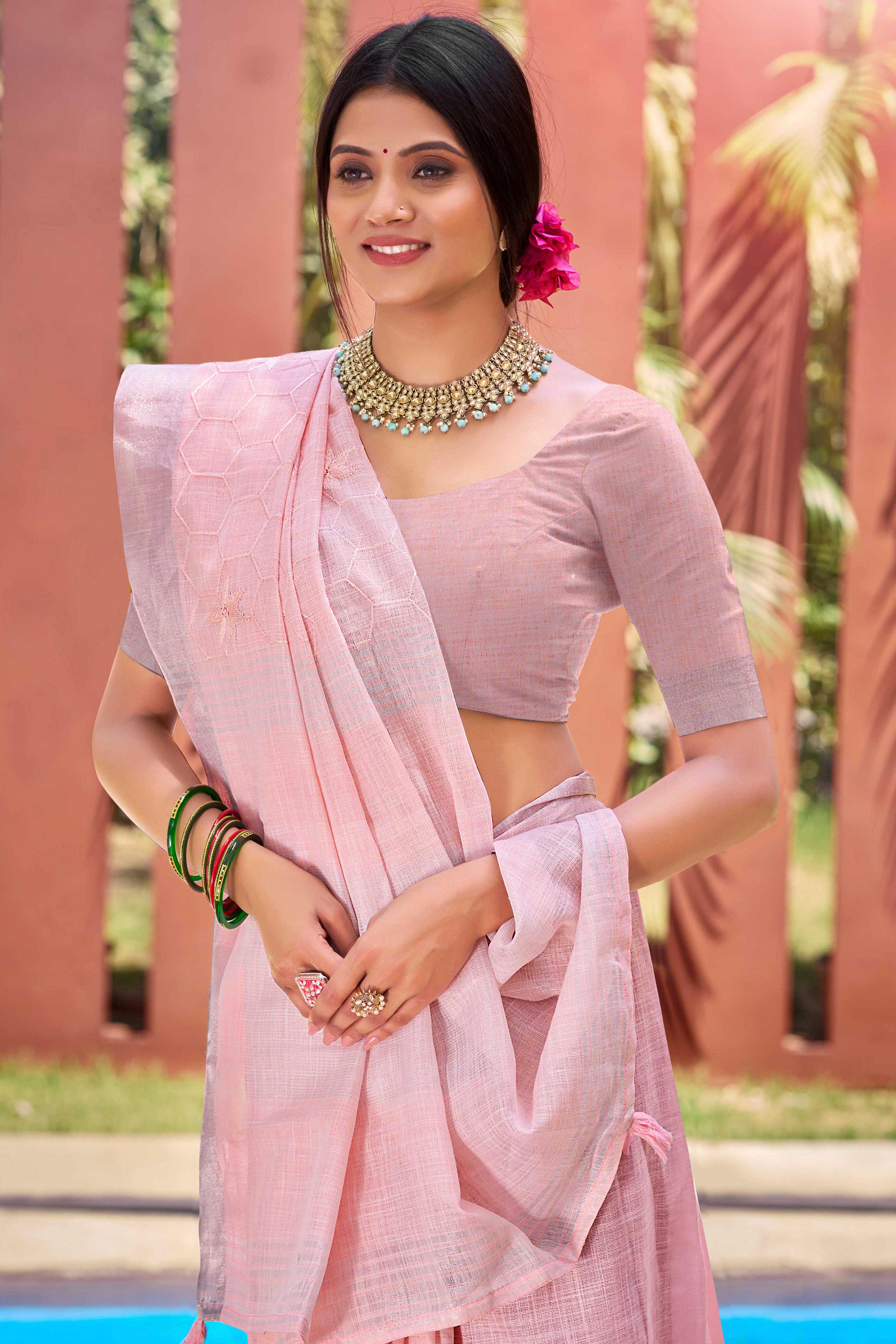 Pink Classic Linen Saree Enhanced With Fine Geometric Embroidery Work & Tassel Pallu