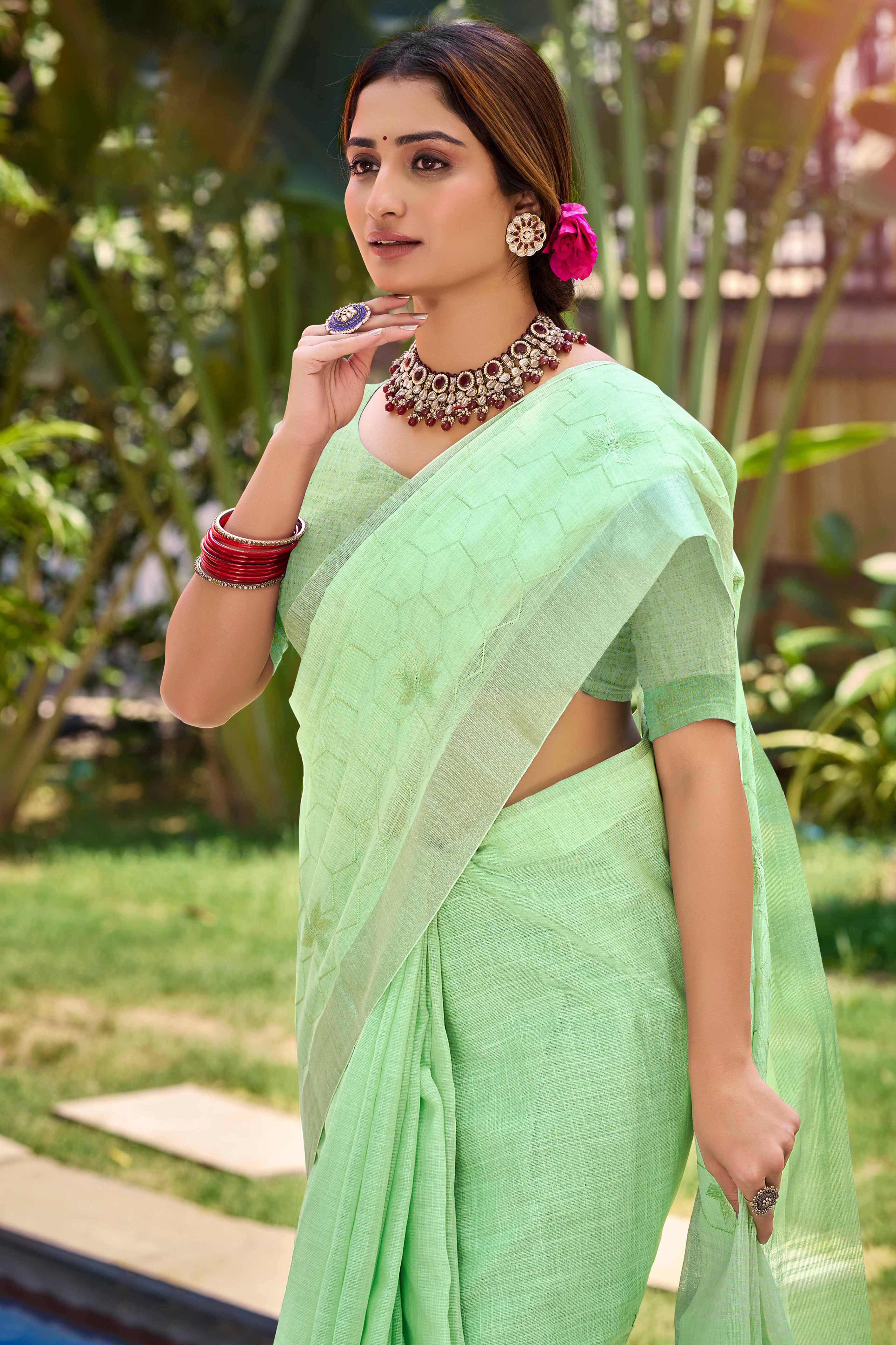 Light Green Classic Linen Saree Enhanced With Fine Geometric Embroidery Work & Tassel Pallu