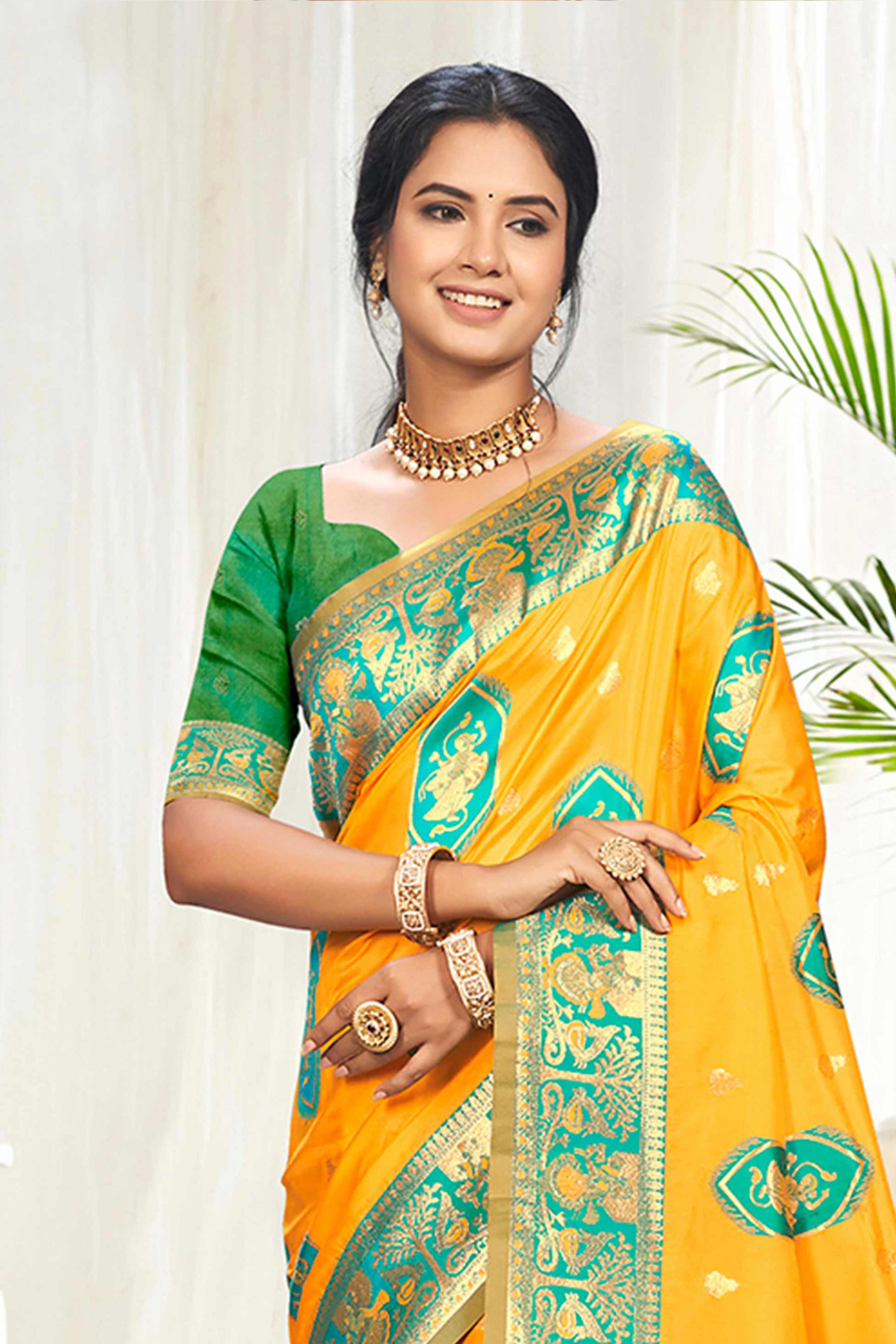 Mesmerizing Mustard Traditional style Weaving Silk Blend Saree With Graceful Tassel Pallu