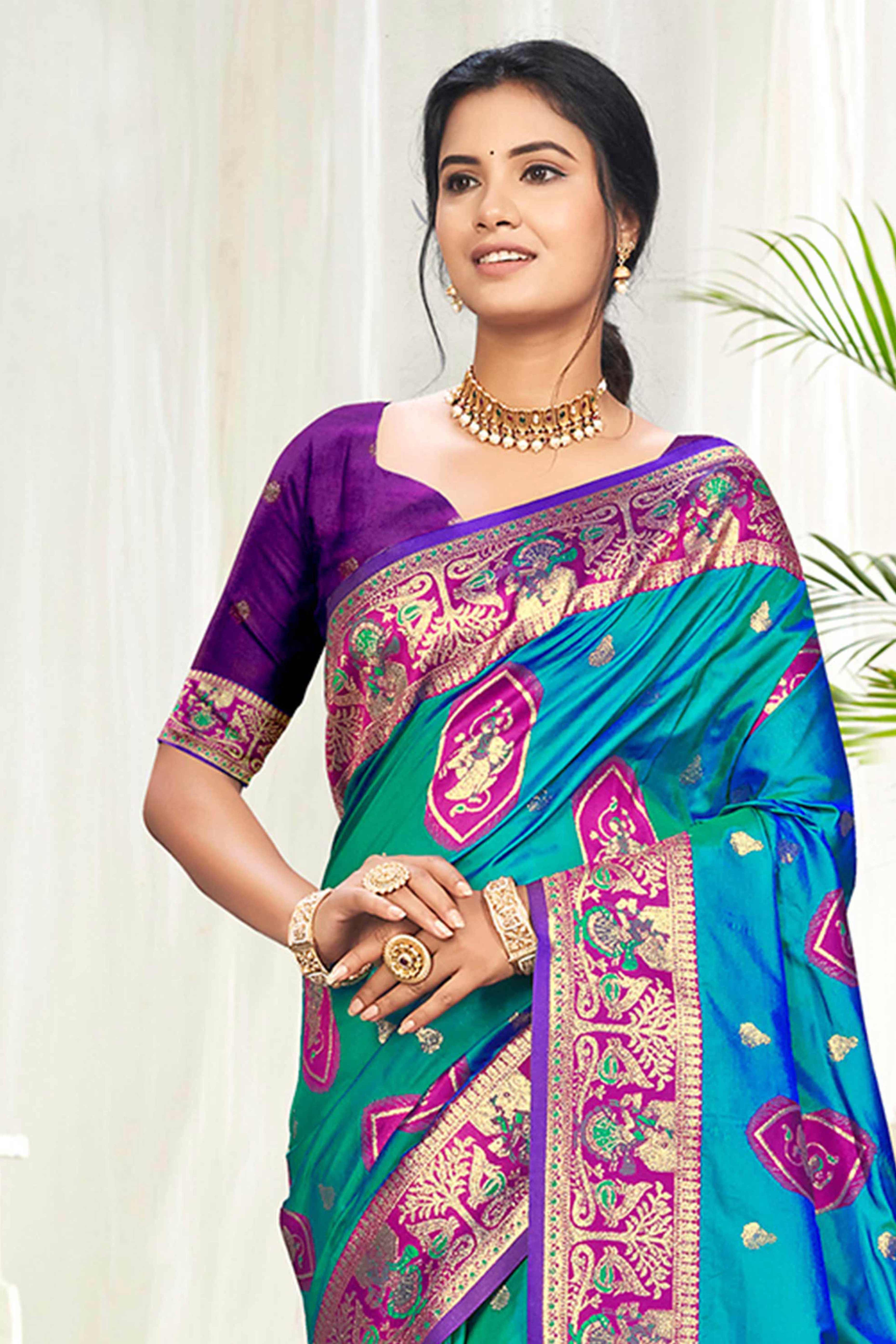 Mesmerizing Morpich Blue Traditional style Weaving Silk Blend Saree With Graceful Tassel Pallu