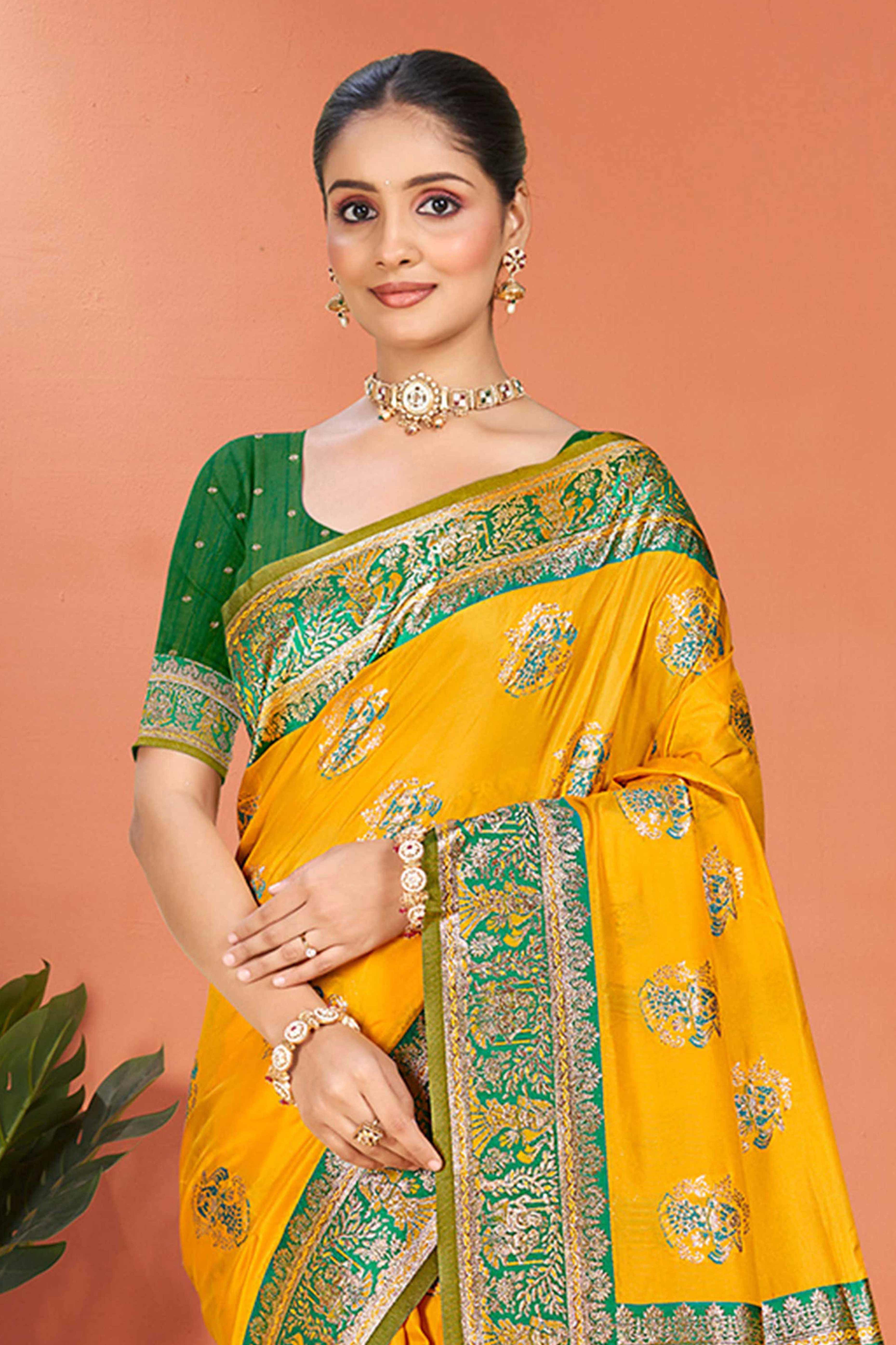 Mustard Traditional Zari Weaving Silk Blend Saree Accented With Tassel Pallu
