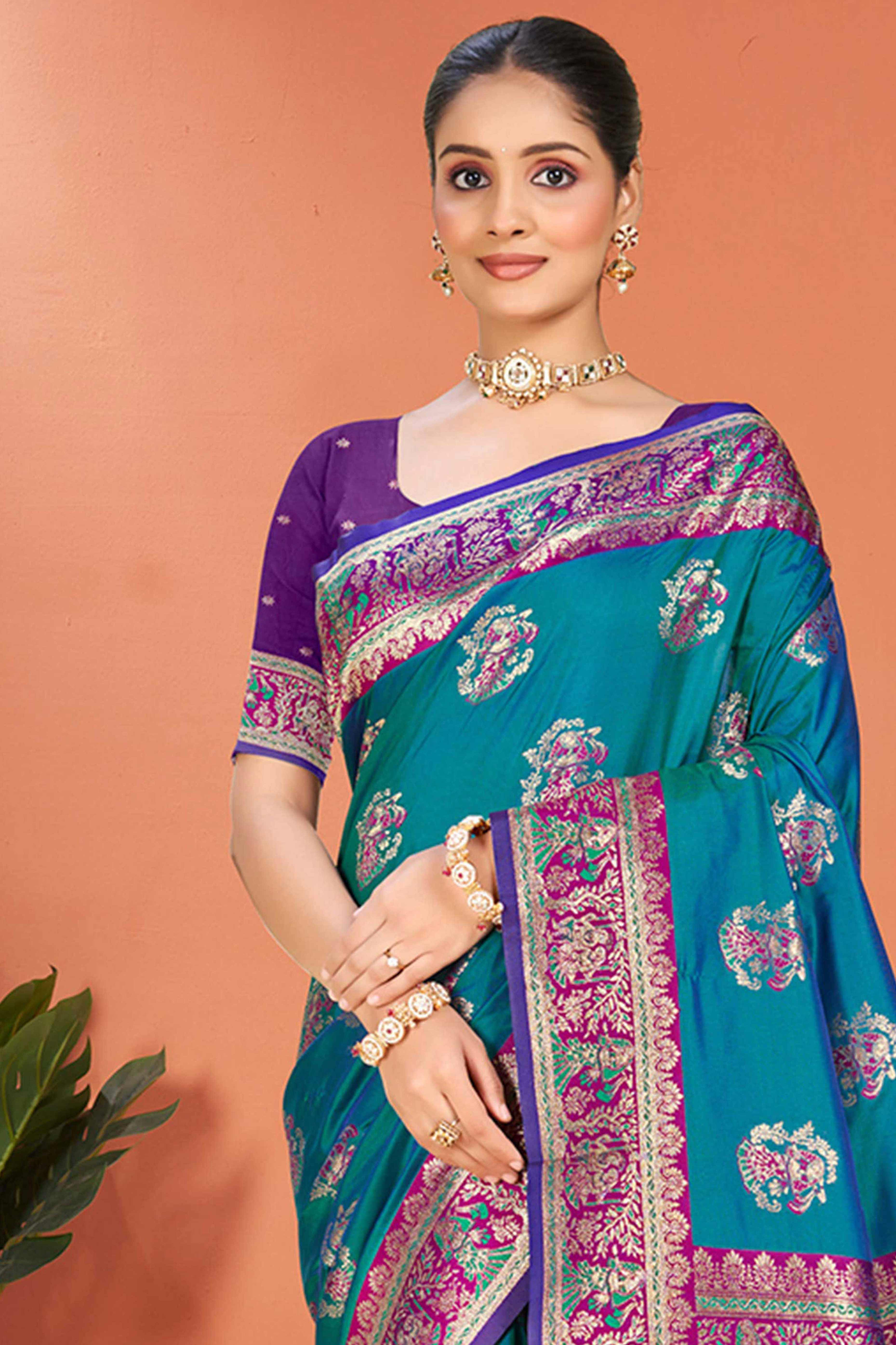 Morpich Blue Traditional Zari Weaving Silk Blend Saree Accented With Tassel Pallu
