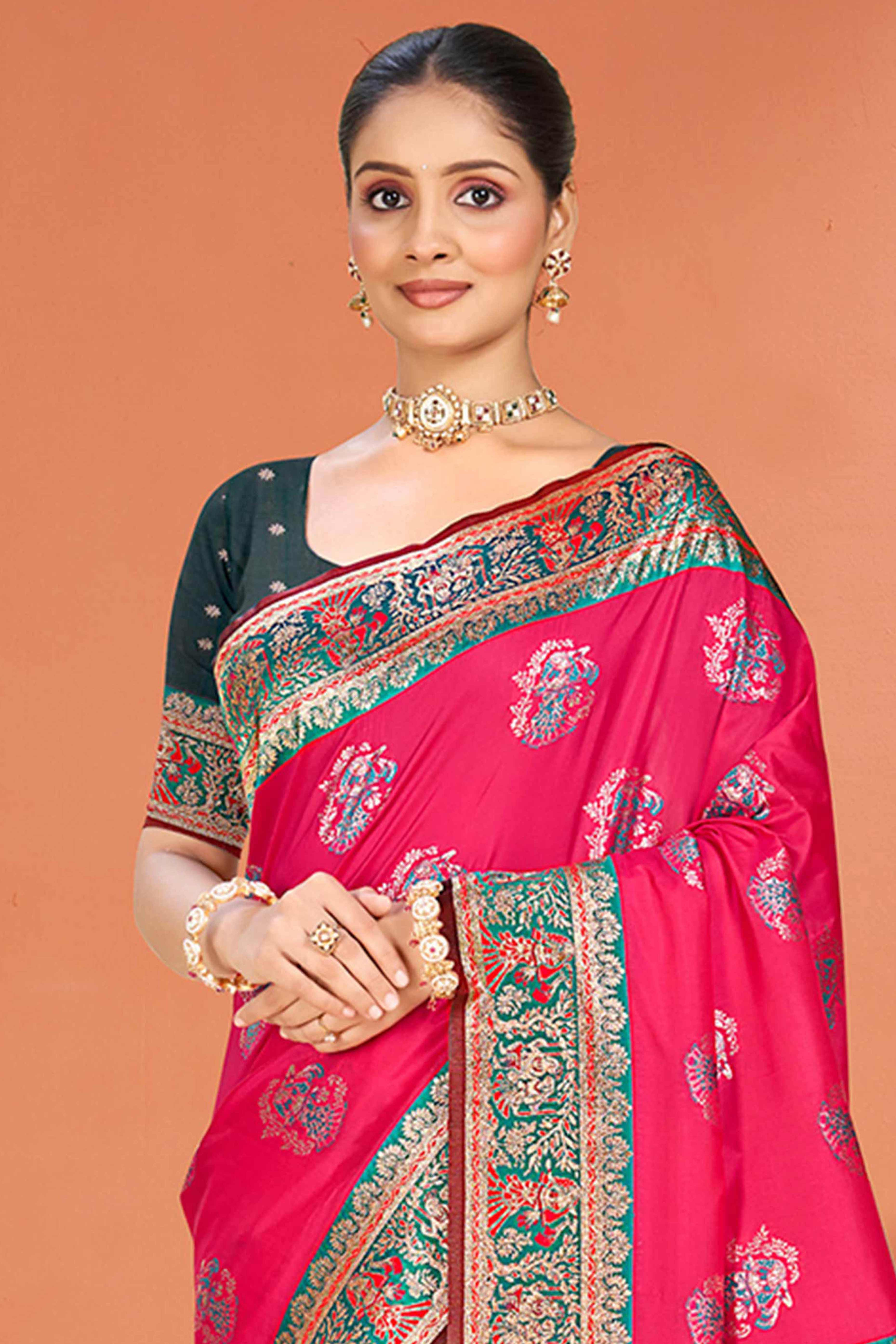 Pink Traditional Zari Weaving Silk Blend Saree Accented With Tassel Pallu