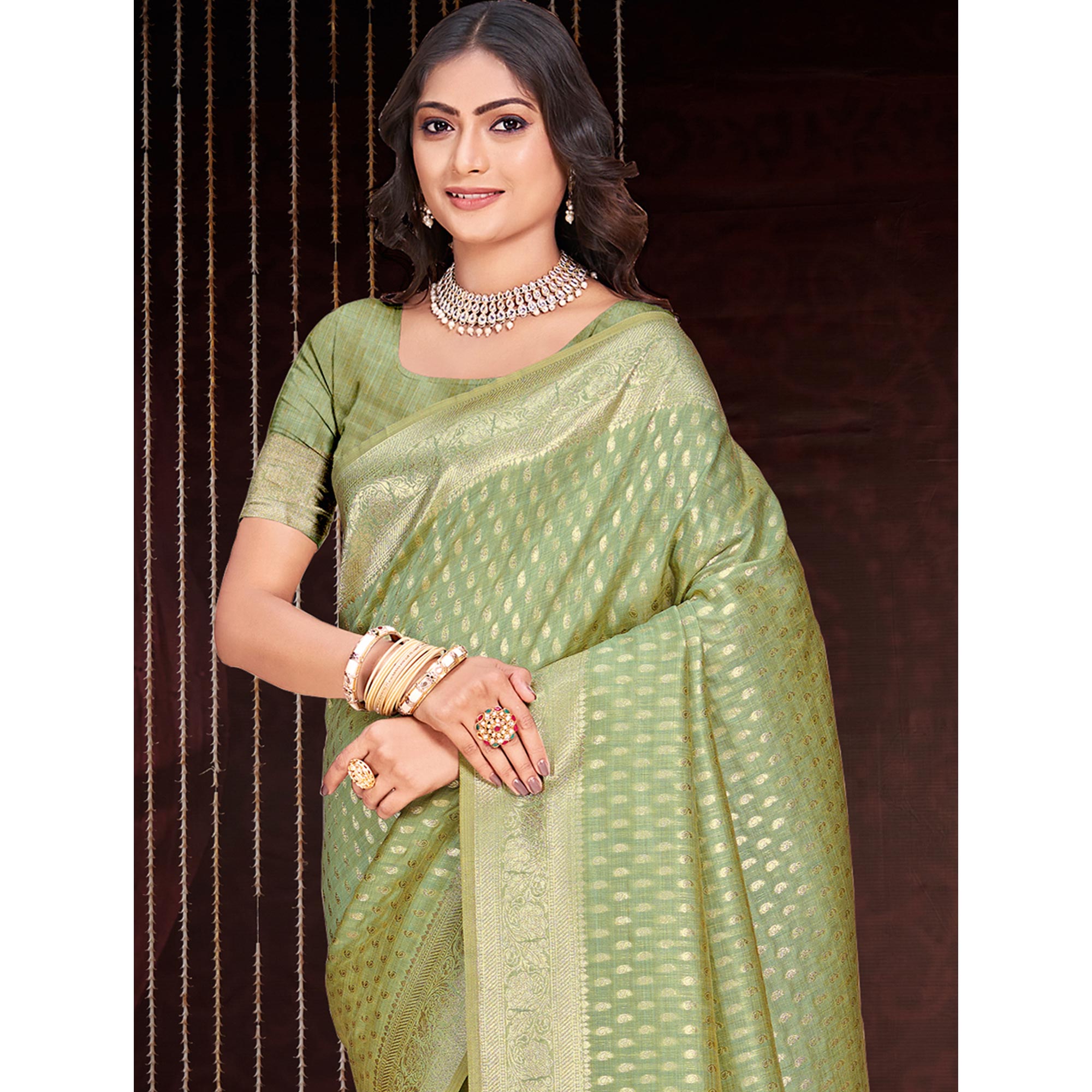 Green Floral Woven Cotton Silk Saree With Tassels