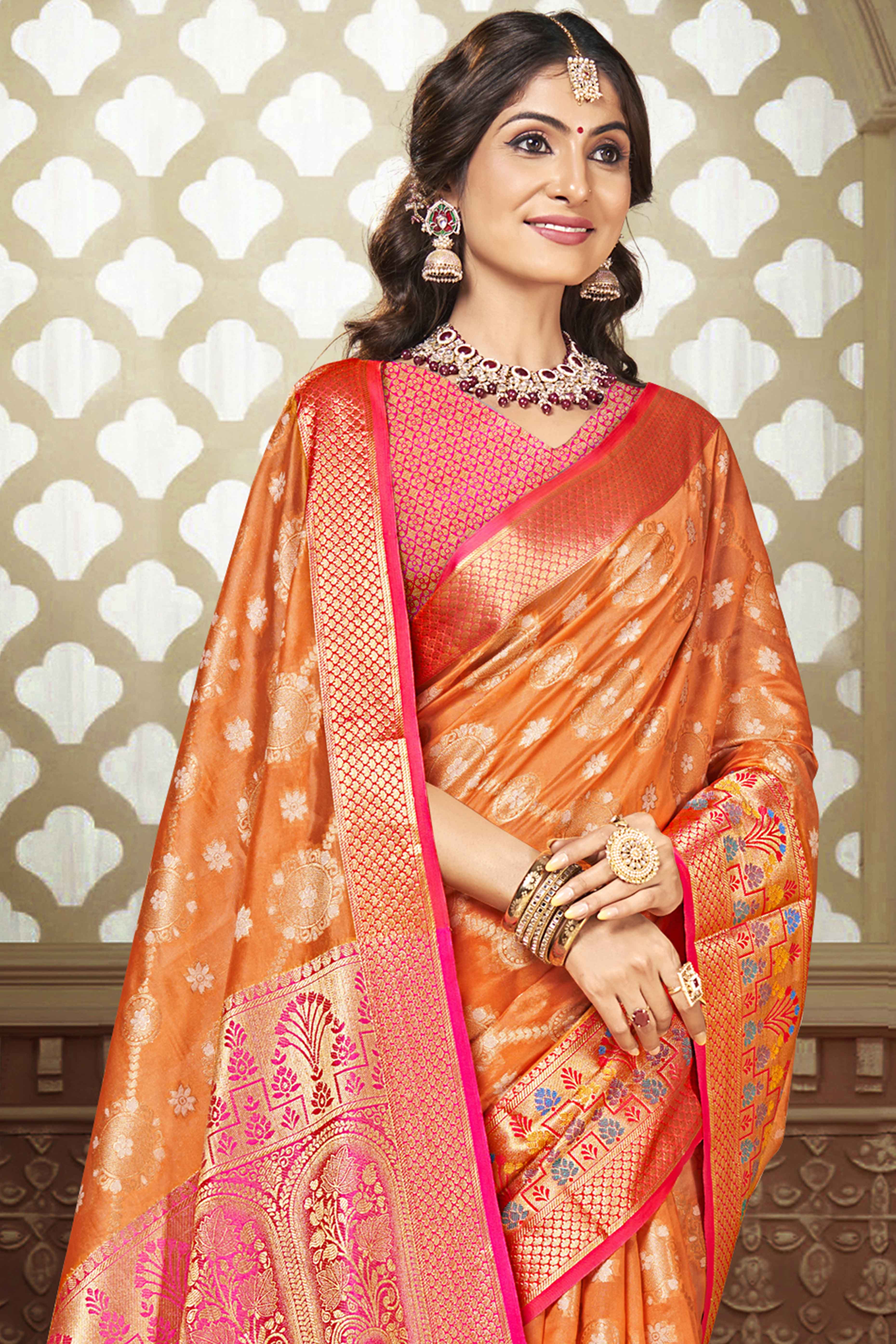 Orange Floral Woven Banarasi Silk Saree With Tassels