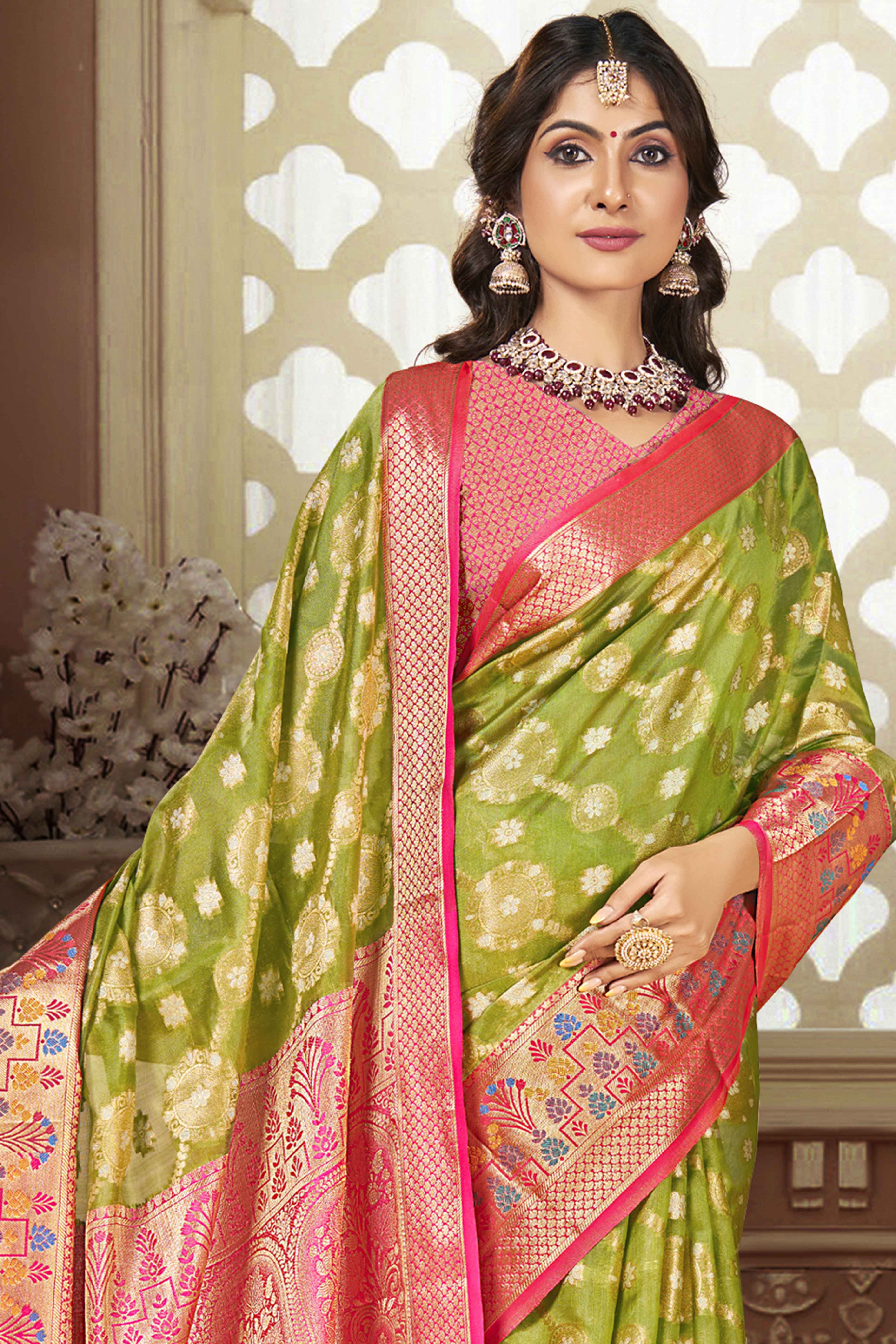 Green Floral Woven Banarasi Silk Saree With Tassels