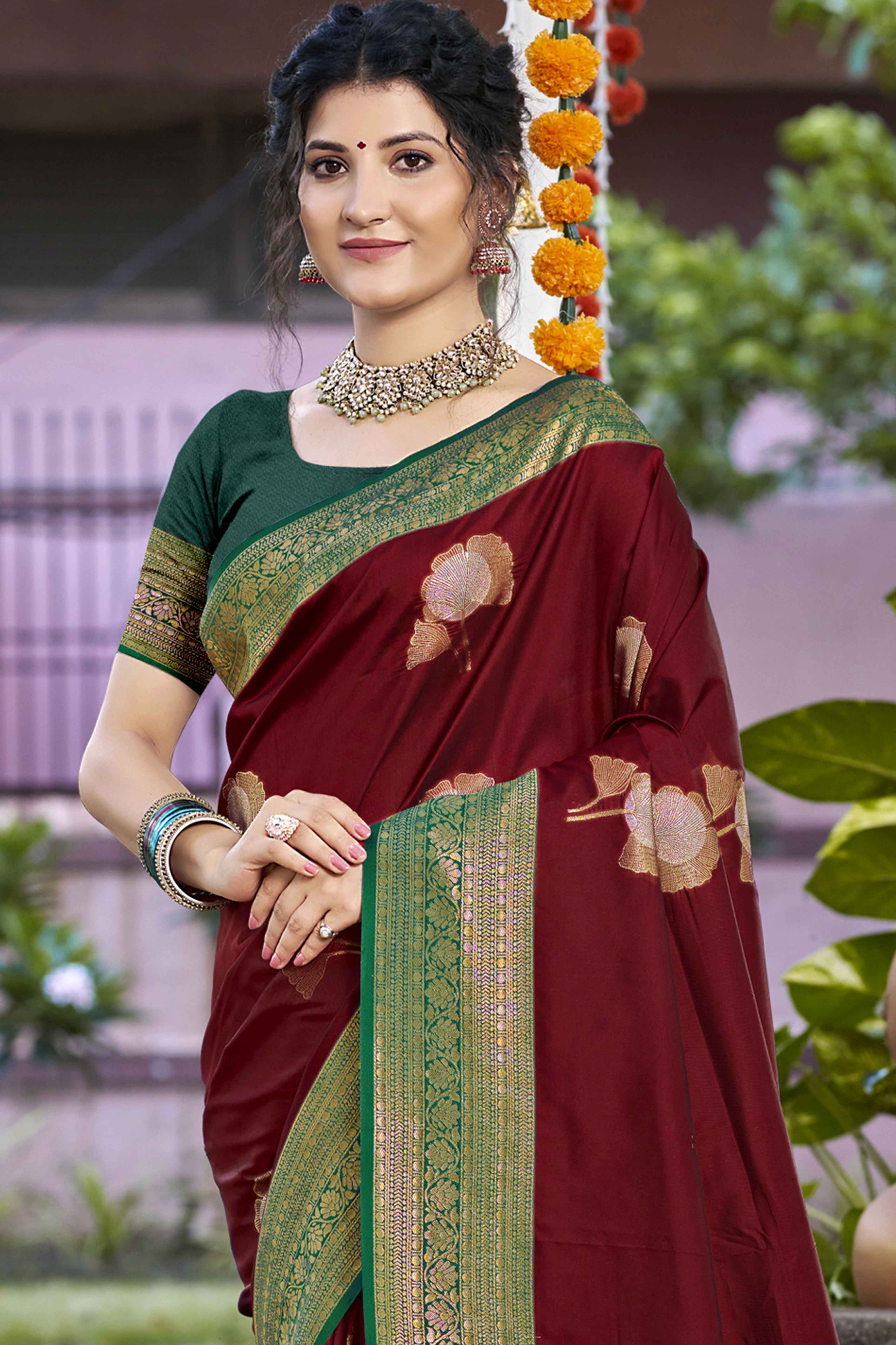 Maroon Floral Woven Banarasi Silk Saree With Tassels