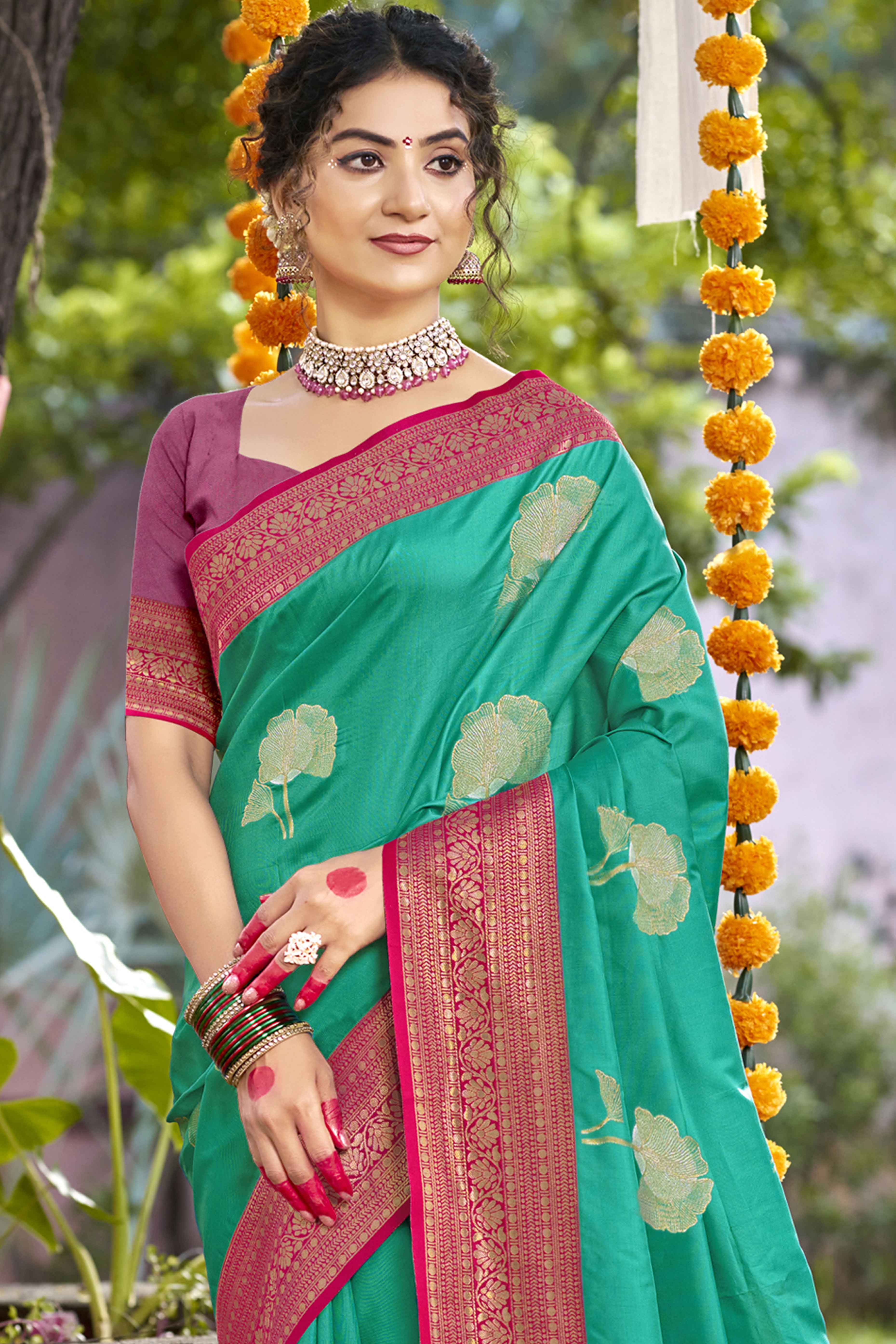 Rama Green Floral Woven Banarasi Silk Saree With Tassels