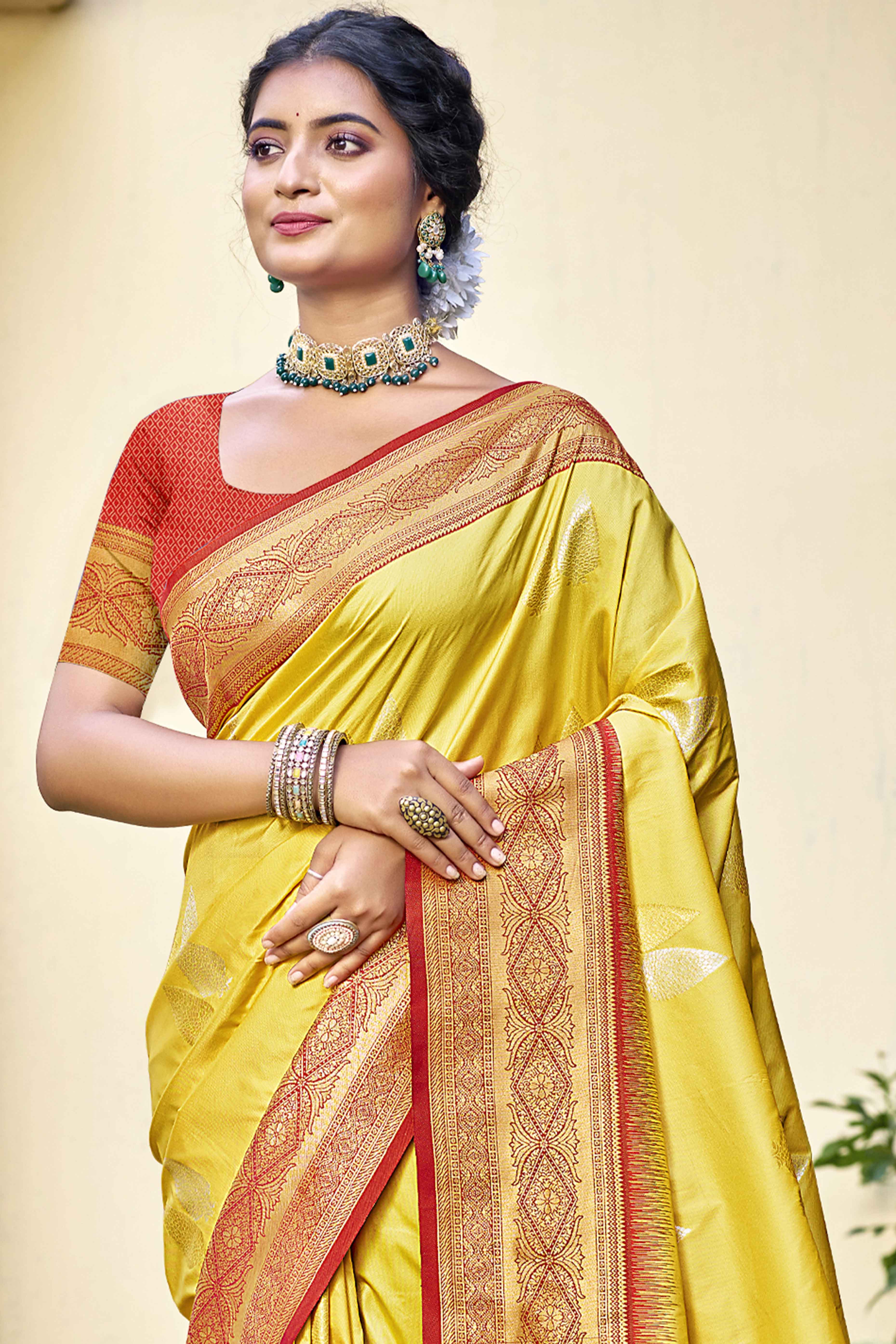 Yellow Woven Banarasi Silk Saree With Tassels