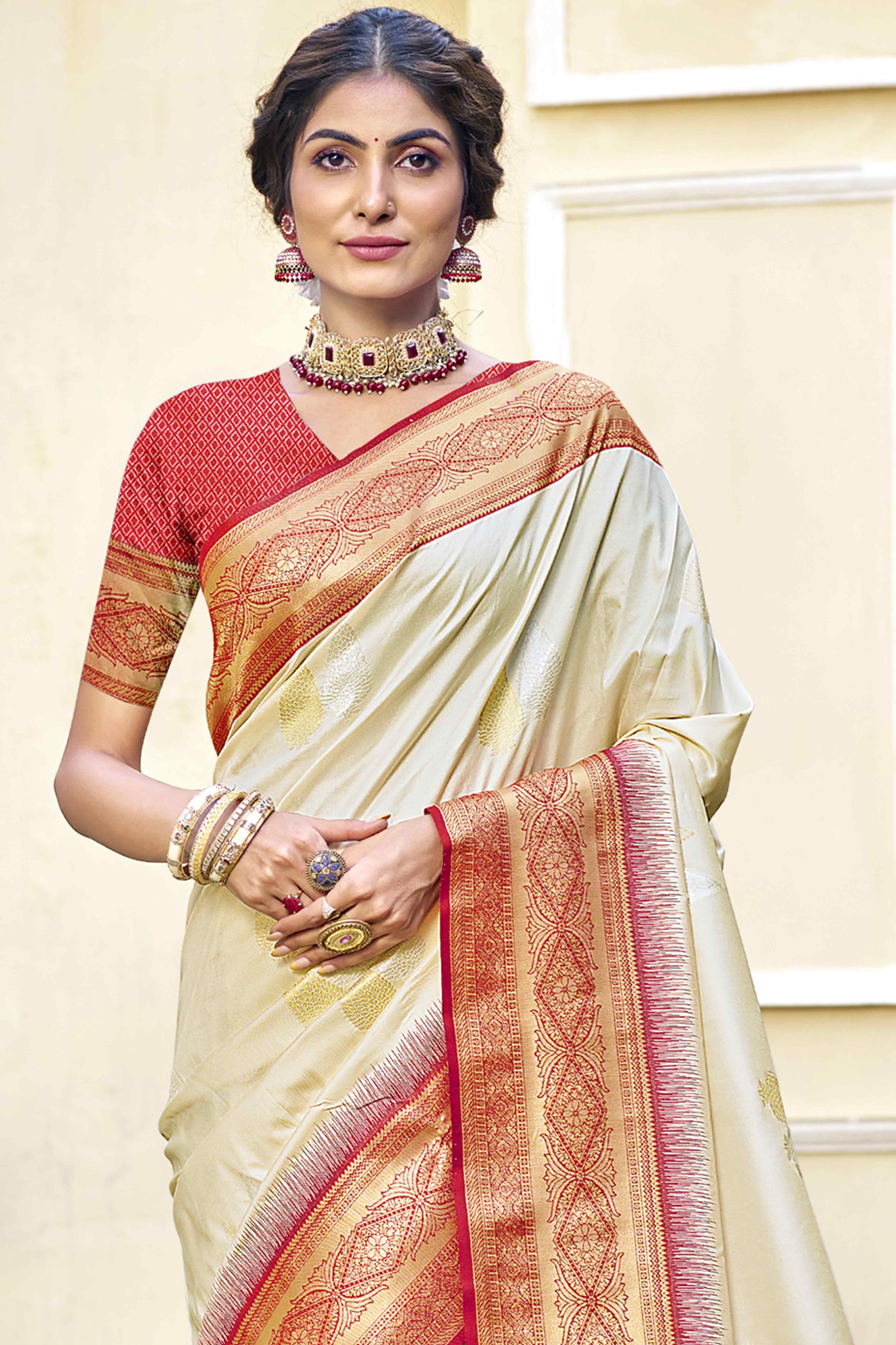 Cream Woven Banarasi Silk Saree With Tassels