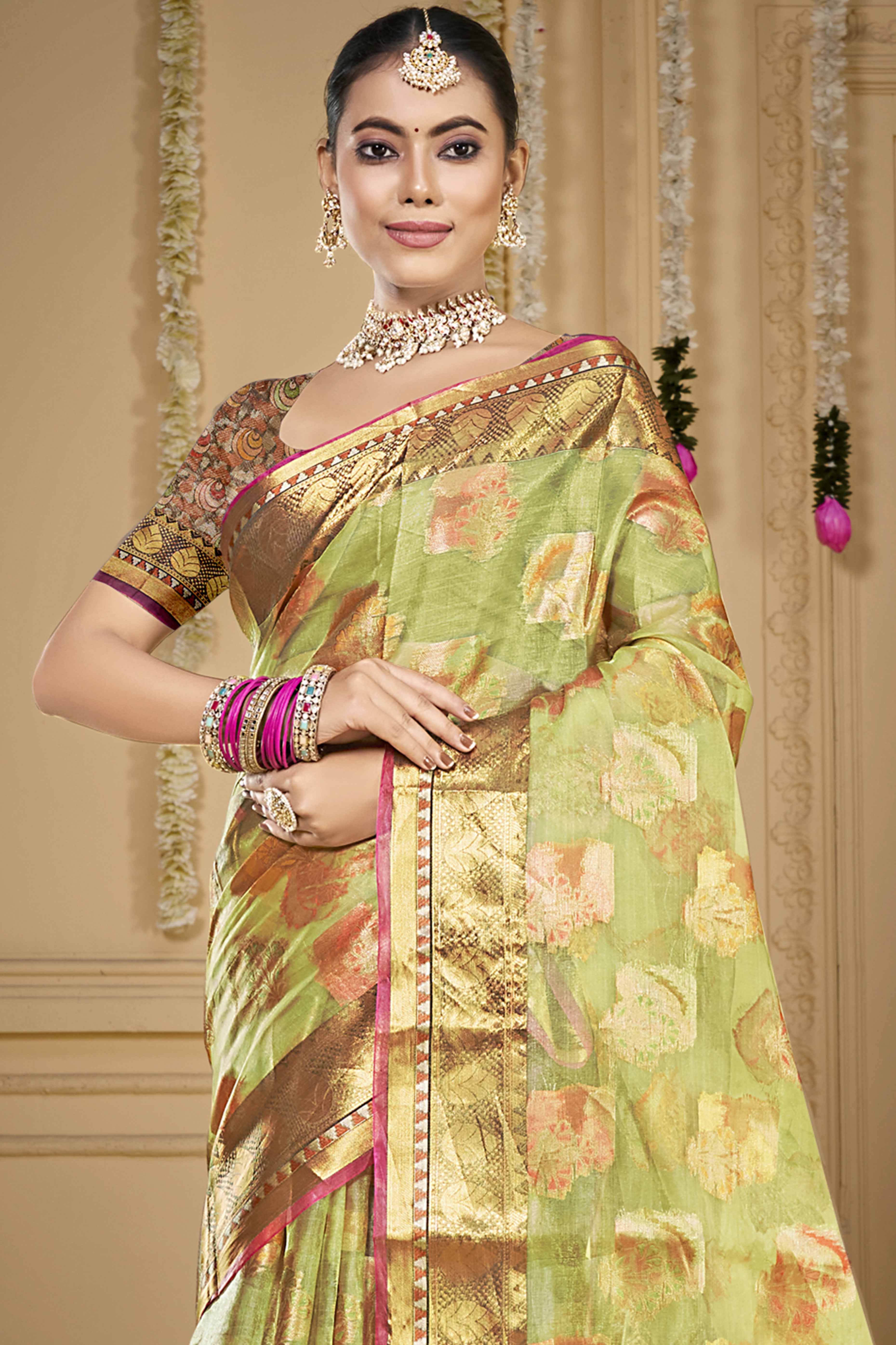 Light Green Floral Woven Organza Saree With Tassels