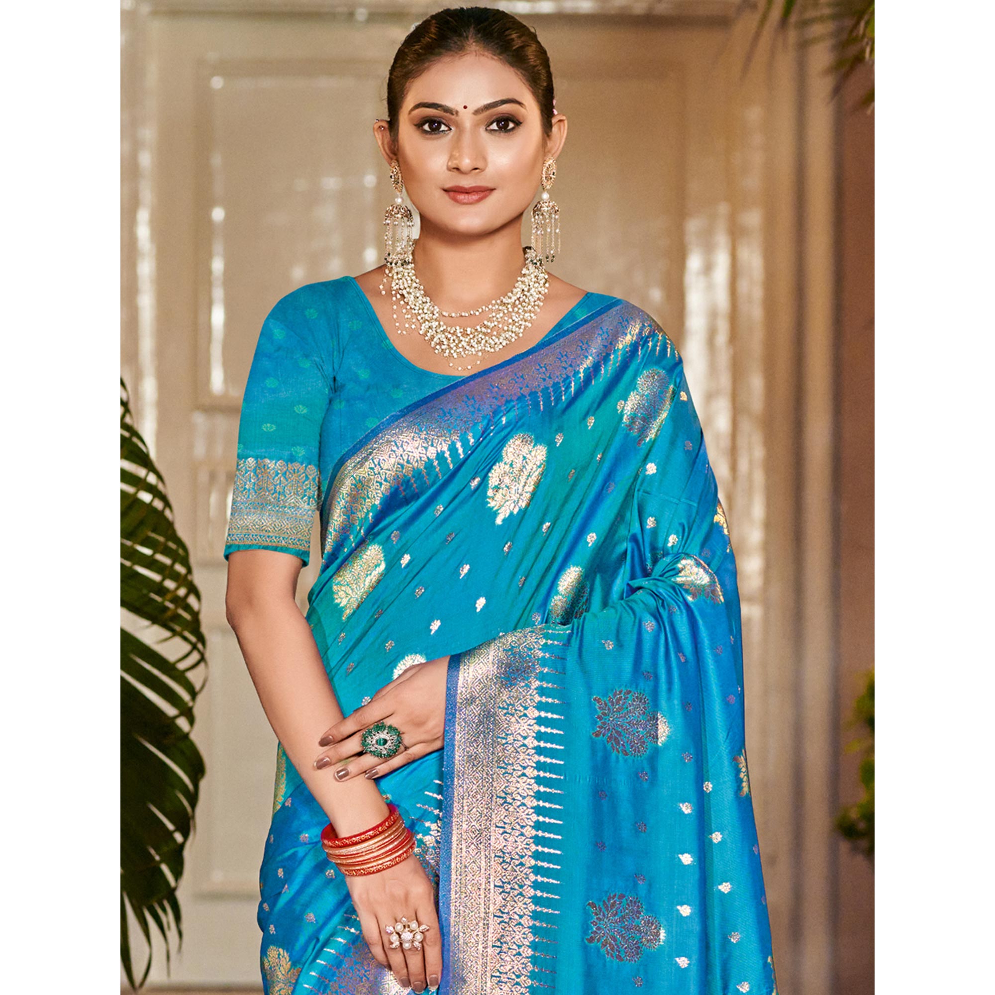 Blue Floral Woven Banarasi Silk Saree With Tassels