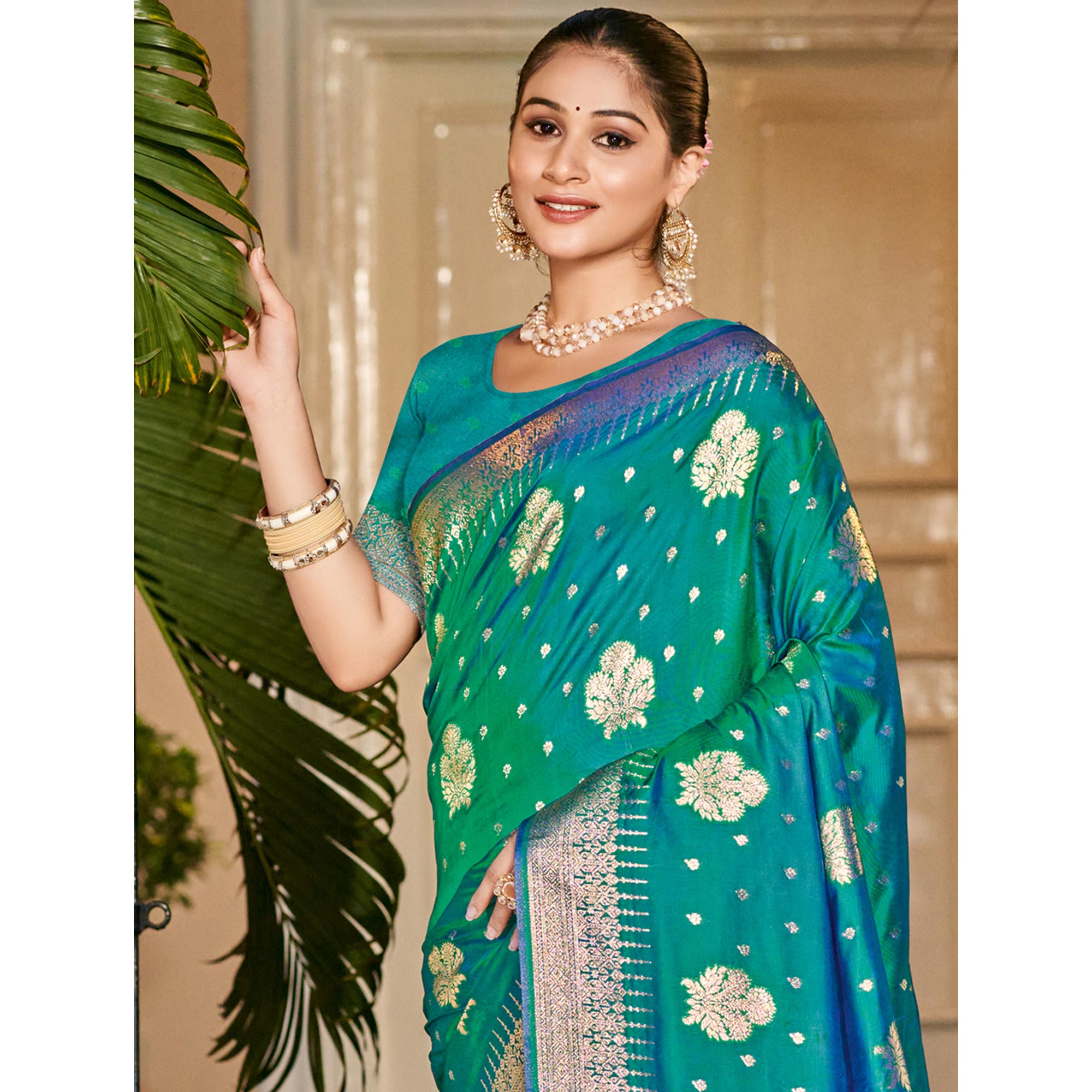 Rama Green Floral Woven Banarasi Silk Saree With Tassels