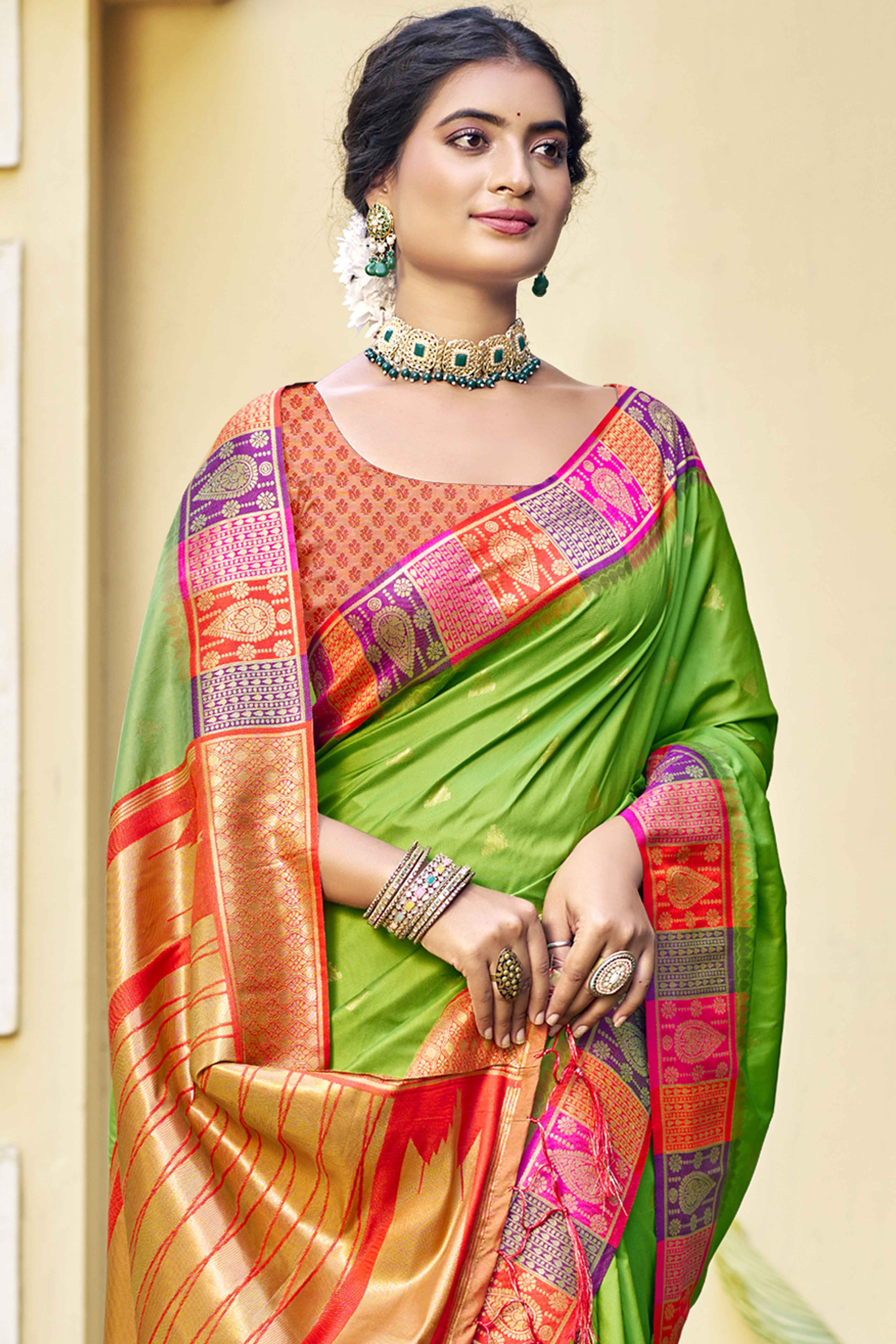 Green Woven Banarasi Silk Saree With Tassels