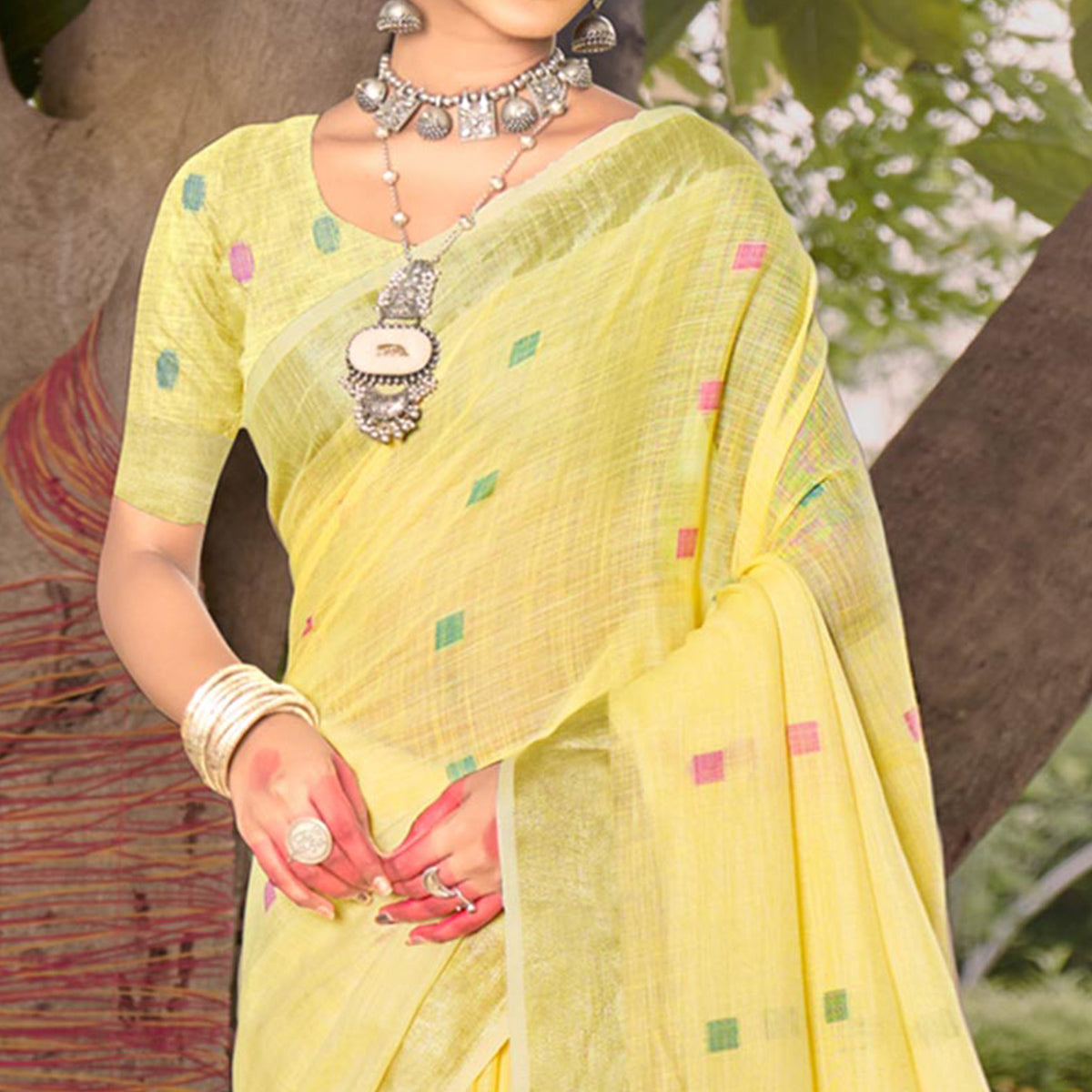 Yellow Woven Cotton Blend Saree With Tassels