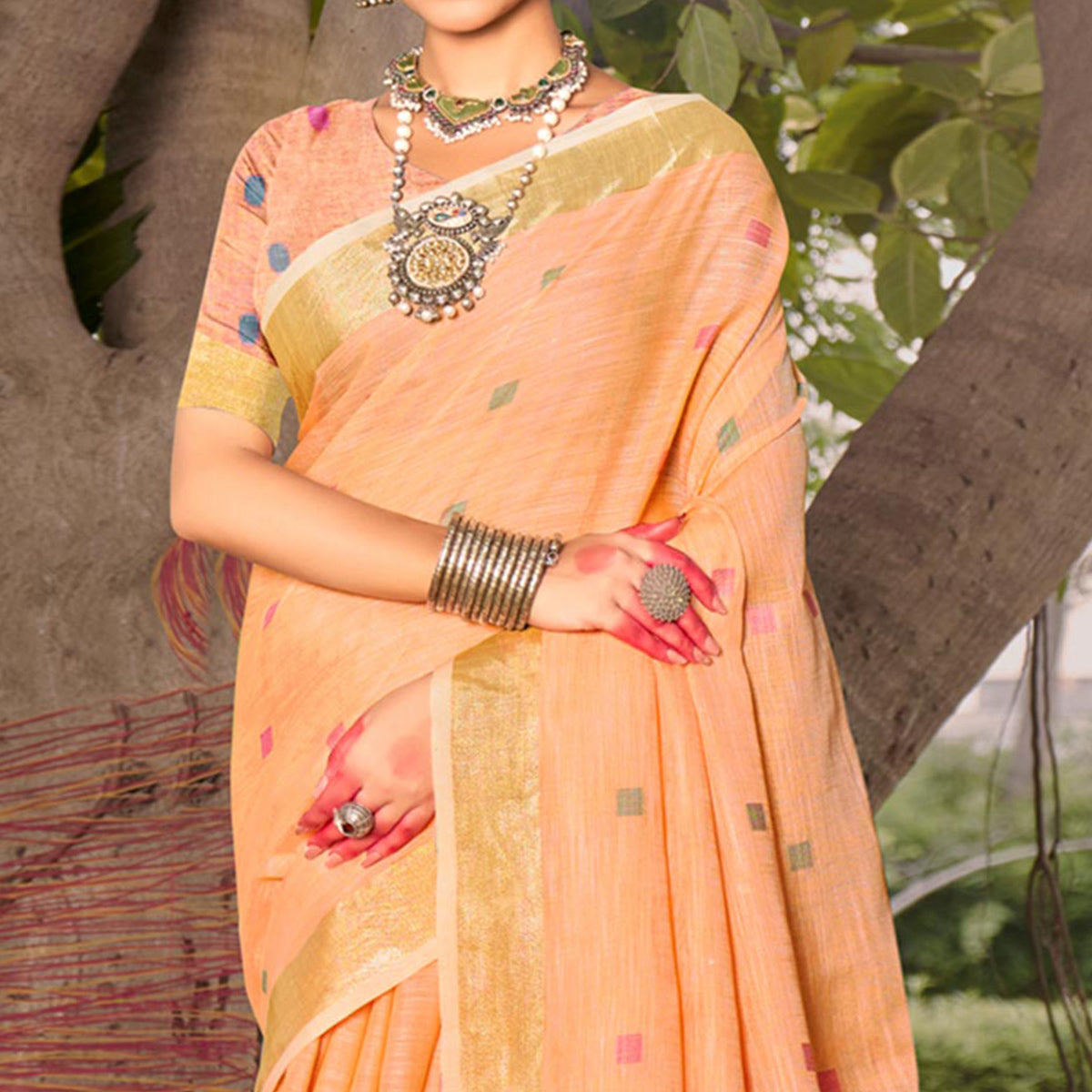 Orange Woven Cotton Blend Saree With Tassels