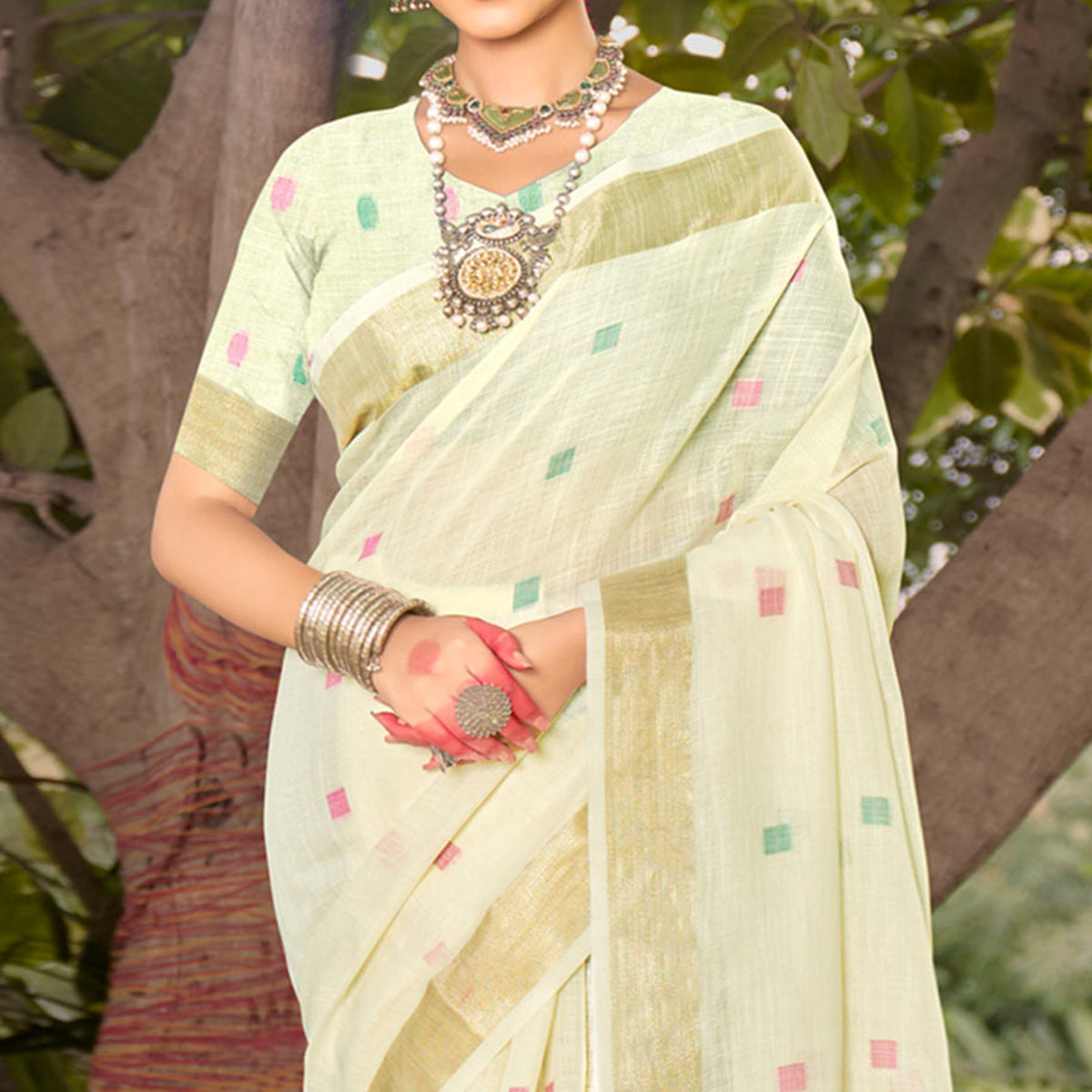 Cream Woven Cotton Blend Saree With Tassels