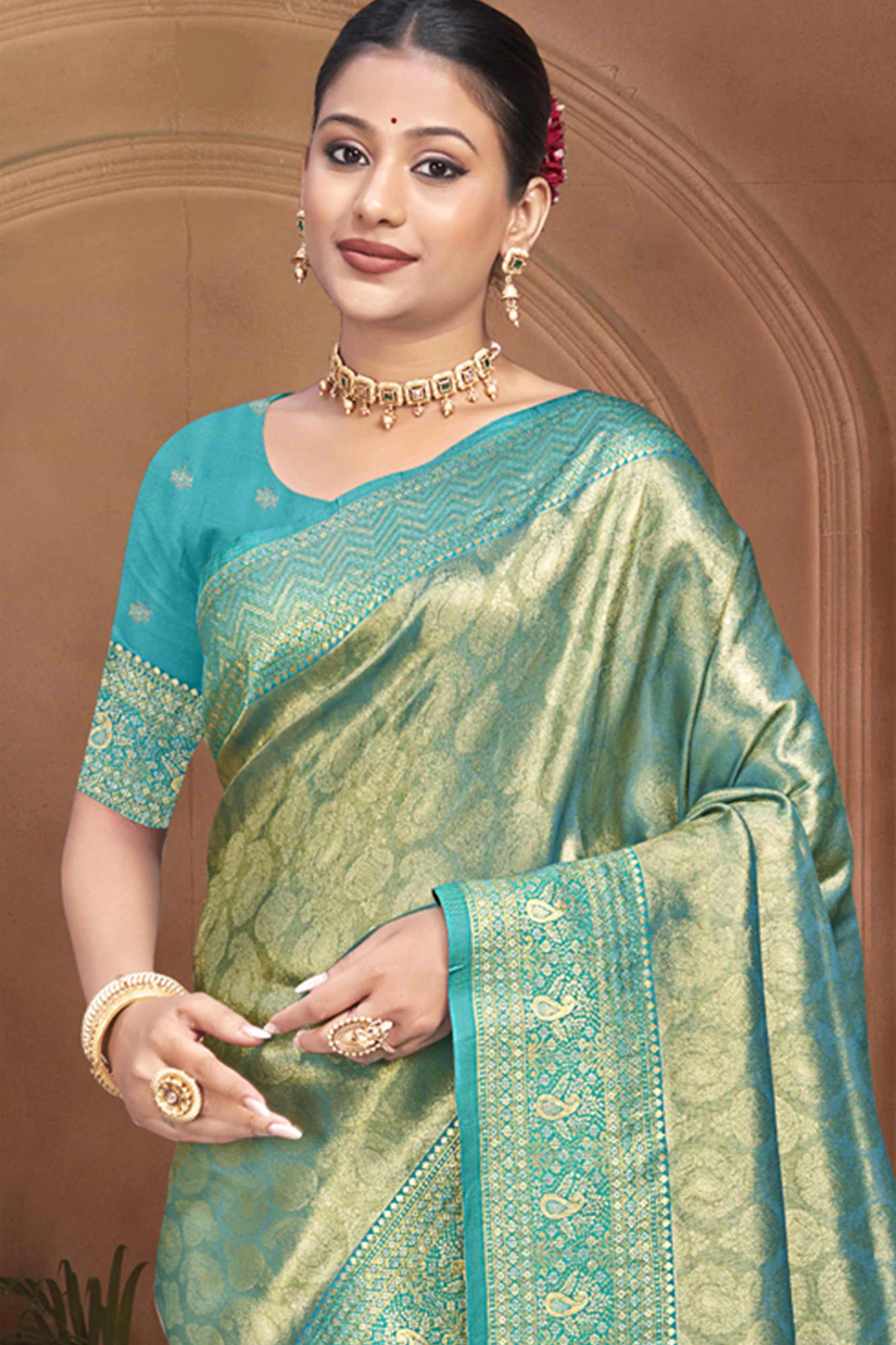 Exclusive Turquoise Paisley & Floral Pattern Weaving Kanjivaram Silk Saree With Tassel Pallu