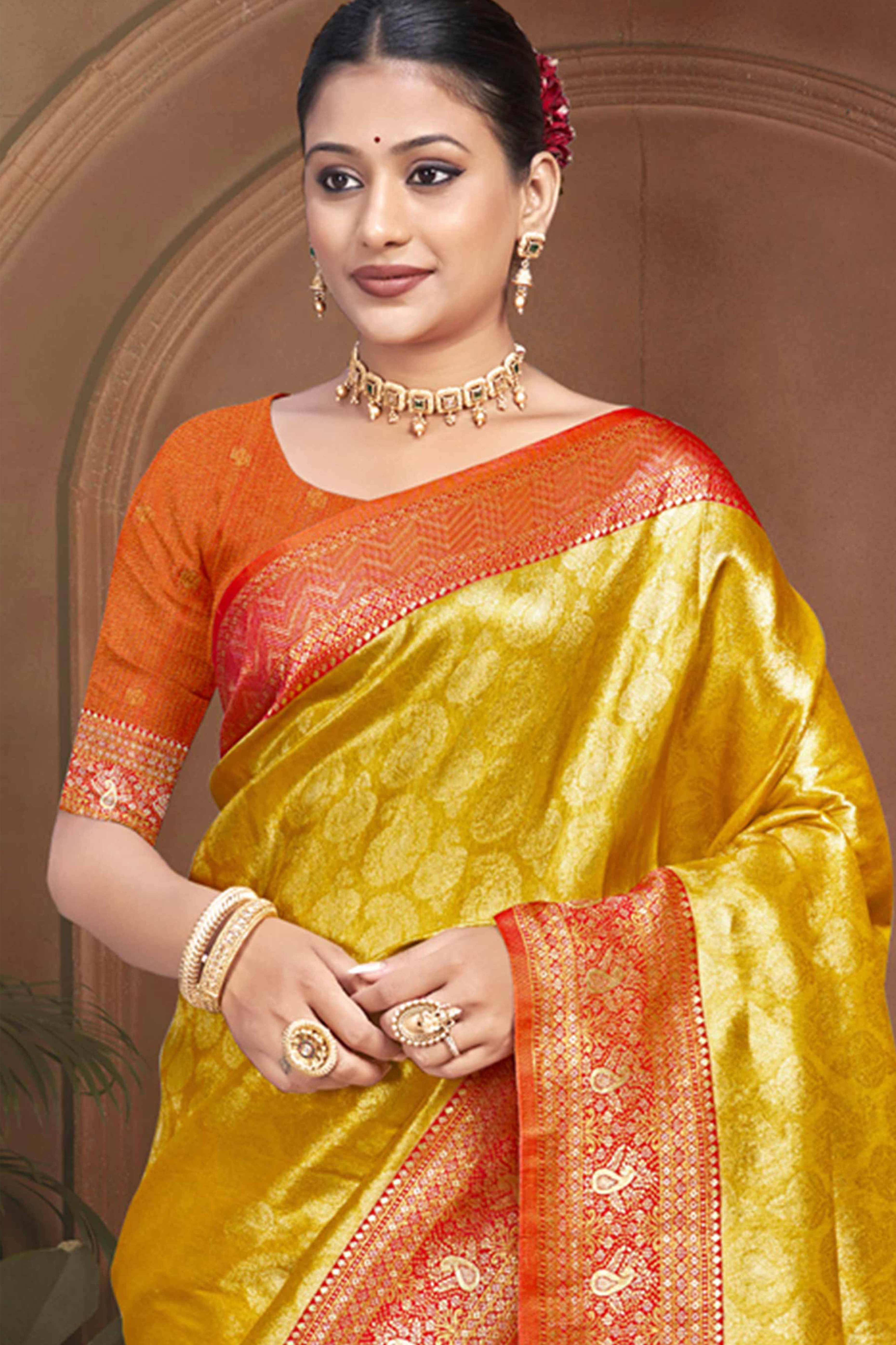 Exclusive Yellow Paisley & Floral Pattern Weaving Kanjivaram Silk Saree With Tassel Pallu