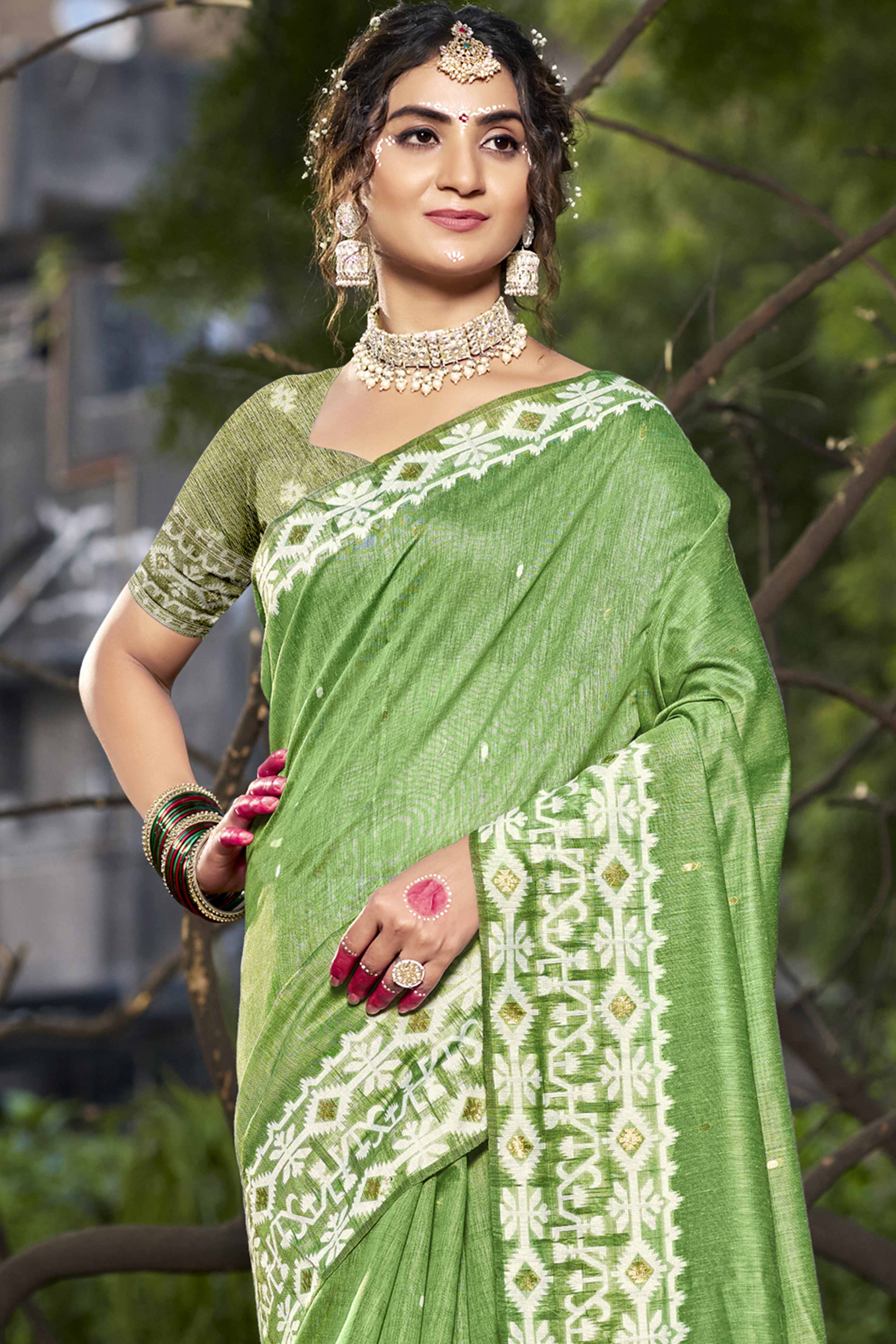 Light Green Woven Linen Cotton Saree With Tassels