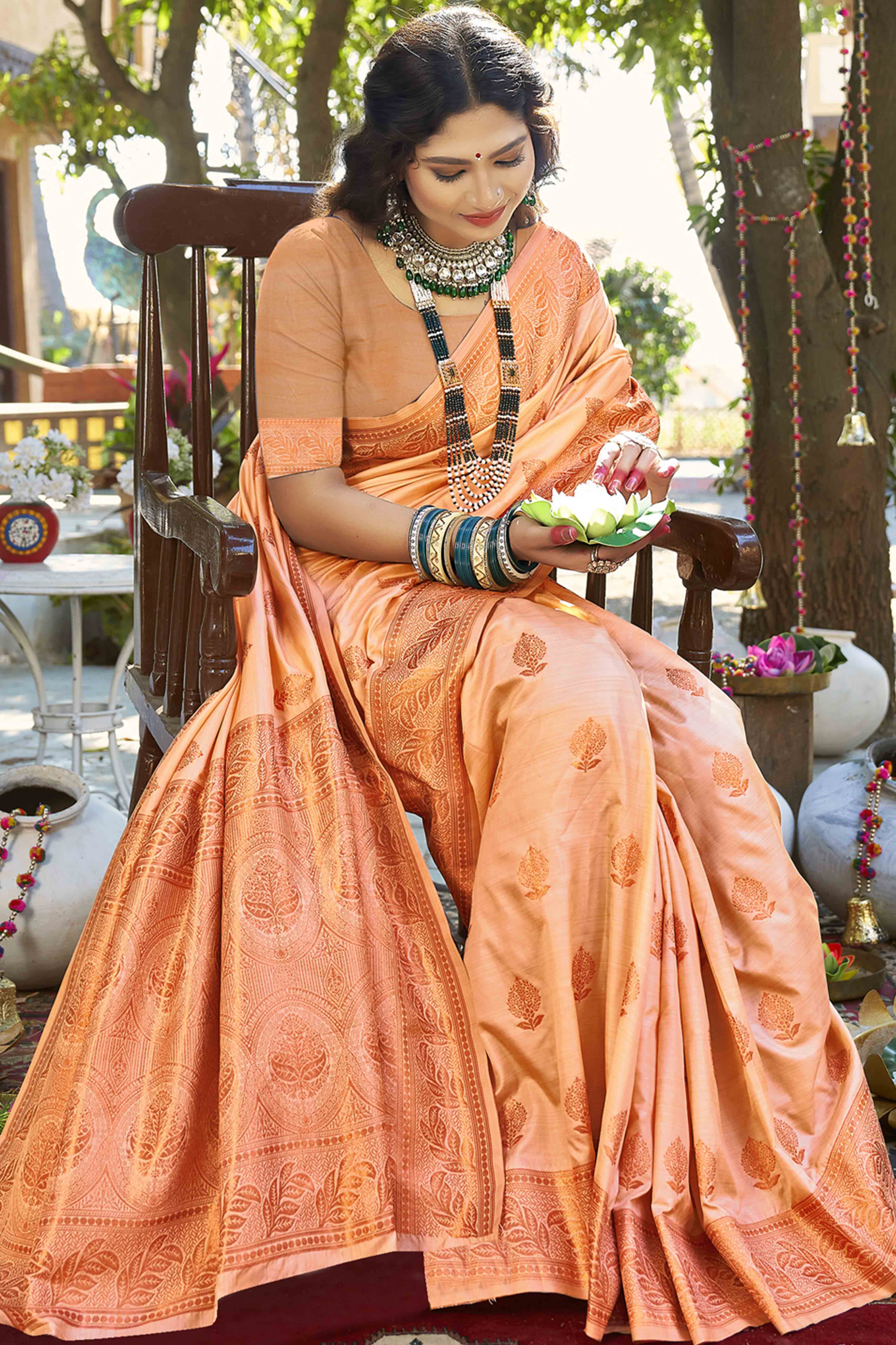 Graceful Emerald Floral Zari Woven Banarasi Silk Saree In Peach
