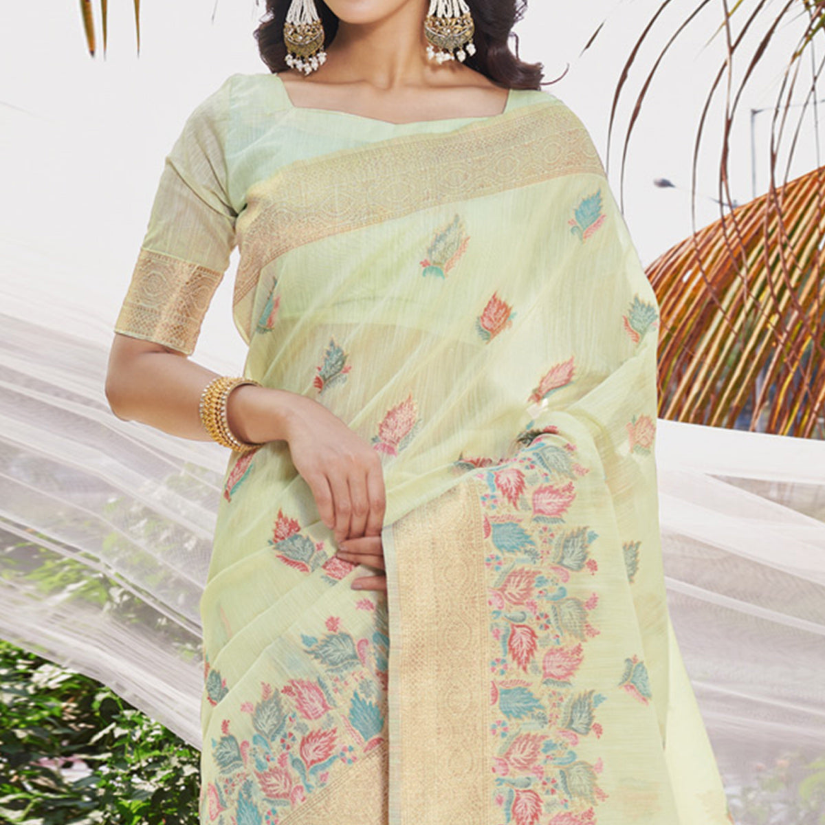 Mint Green Floral Woven Cotton Silk Saree With Tassels